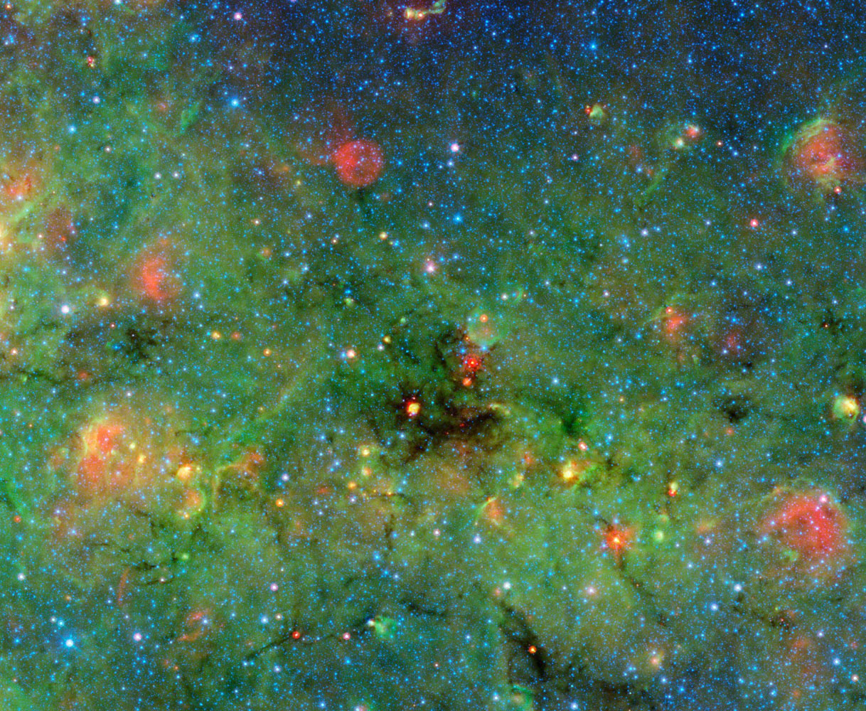 A huge cosmic cloud of gas and dust which will likely evolve into one of the most massive young clusters of stars in our galaxy is shown in an image obtained on May 22, 2014. The densest clumps will blossom into the cluster's biggest, most powerful stars, called O-type stars, the formation of which have long puzzled scientists.