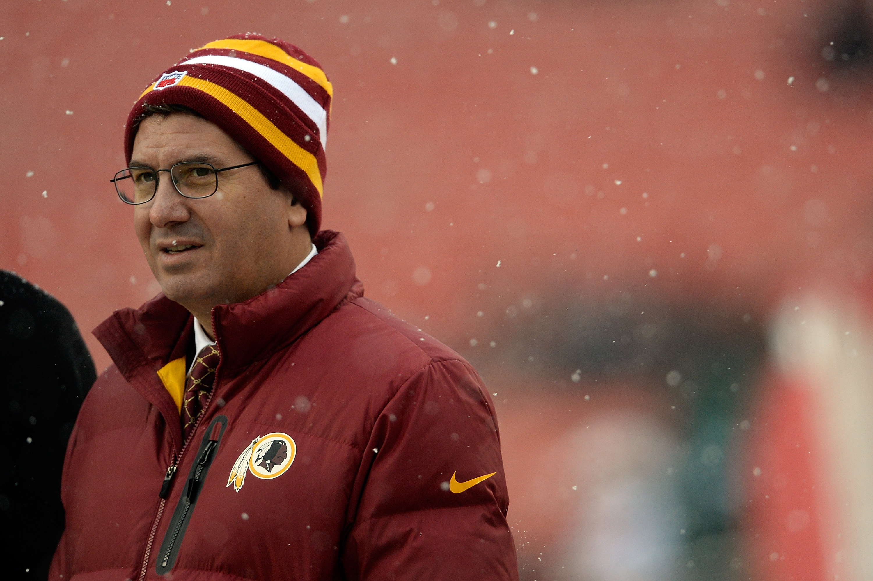 Washington Redskins owner Daniel Snyder watches warmups before an NFL game between the Kansas City Chiefs and Washington Redskins at FedExField on December 8, 2013 in Landover, Maryland. (Patrick McDermott--Getty Images)