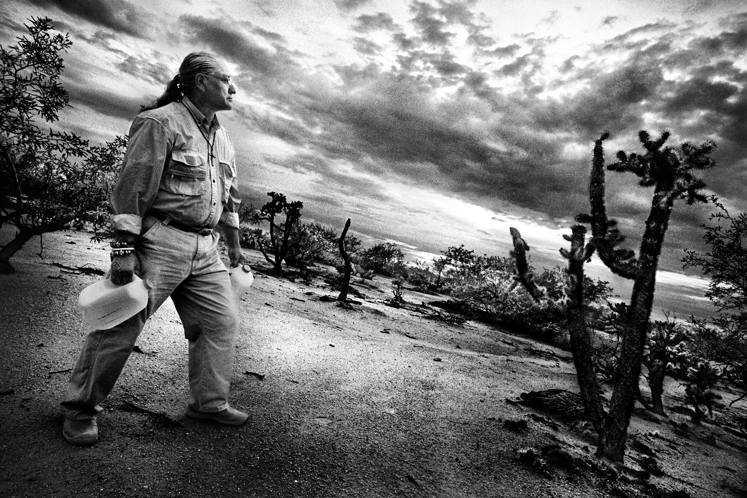 Mike Wilson, 64 | 
                              Tucson, Ariz. | 
                              July 31, 2013 
                              
                              Wilson, a volunteer with Humane Borders, leaves water in the desert for migrants and leads search missions when they are reported missing.