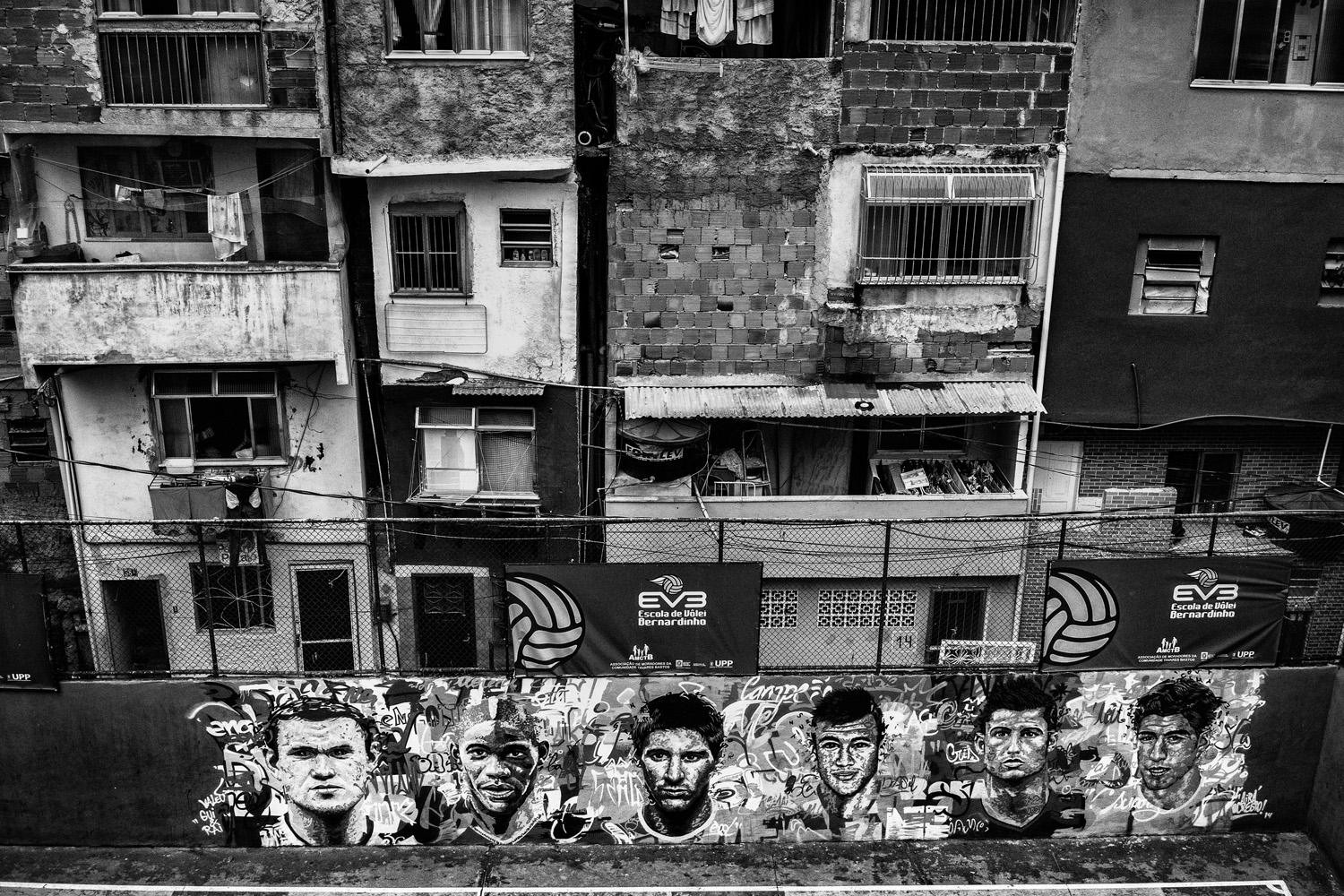 RIO DE JANEIRO, BRAZIL - JUNE 2014: Graffities with face of the world most famous soccer players, as Messi, Rooney, Neymar or Cristiano Ronaldo in a futsal field in he favela of Tavarez Bastos near Rio´s downtown. (Photo by Sebastián Liste/ Reportage by Getty Images)