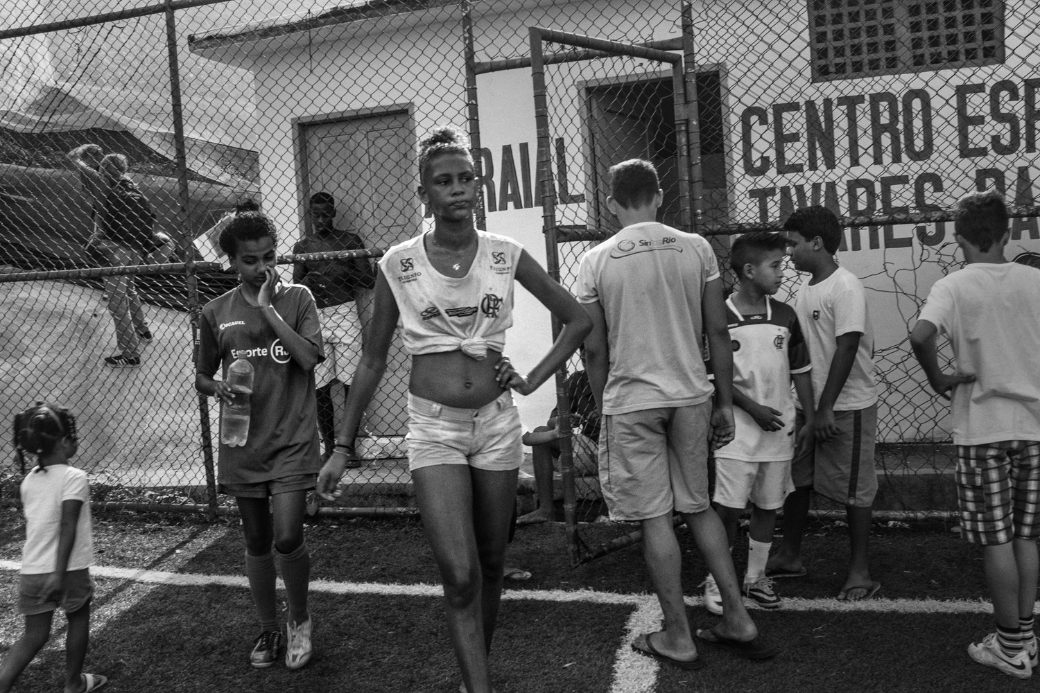 RIO DE JANEIRO, BRAZIL - JUNE 2014: Kids resting after a soccer training in the soccer school for favela kids in Tavares Bastos favela near Rio´s downtown. (Photo by Sebastián Liste/ Reportage by Getty Images)