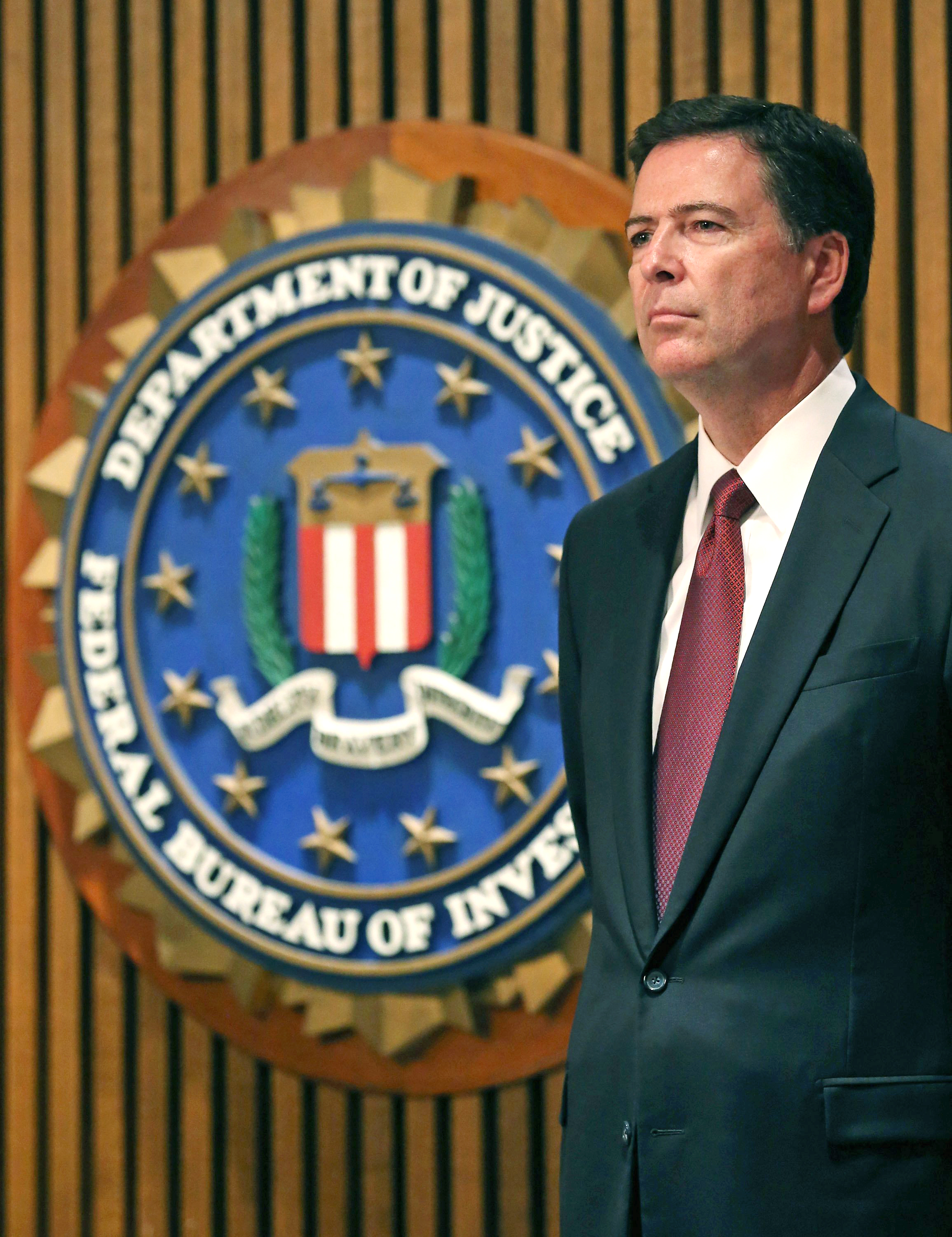 FBI Director James Comey participates in a news conference on child sex trafficking, at FBI headquarters, June 23, 2014 in Washington, D.C. (Mark Wilson—Getty Images)