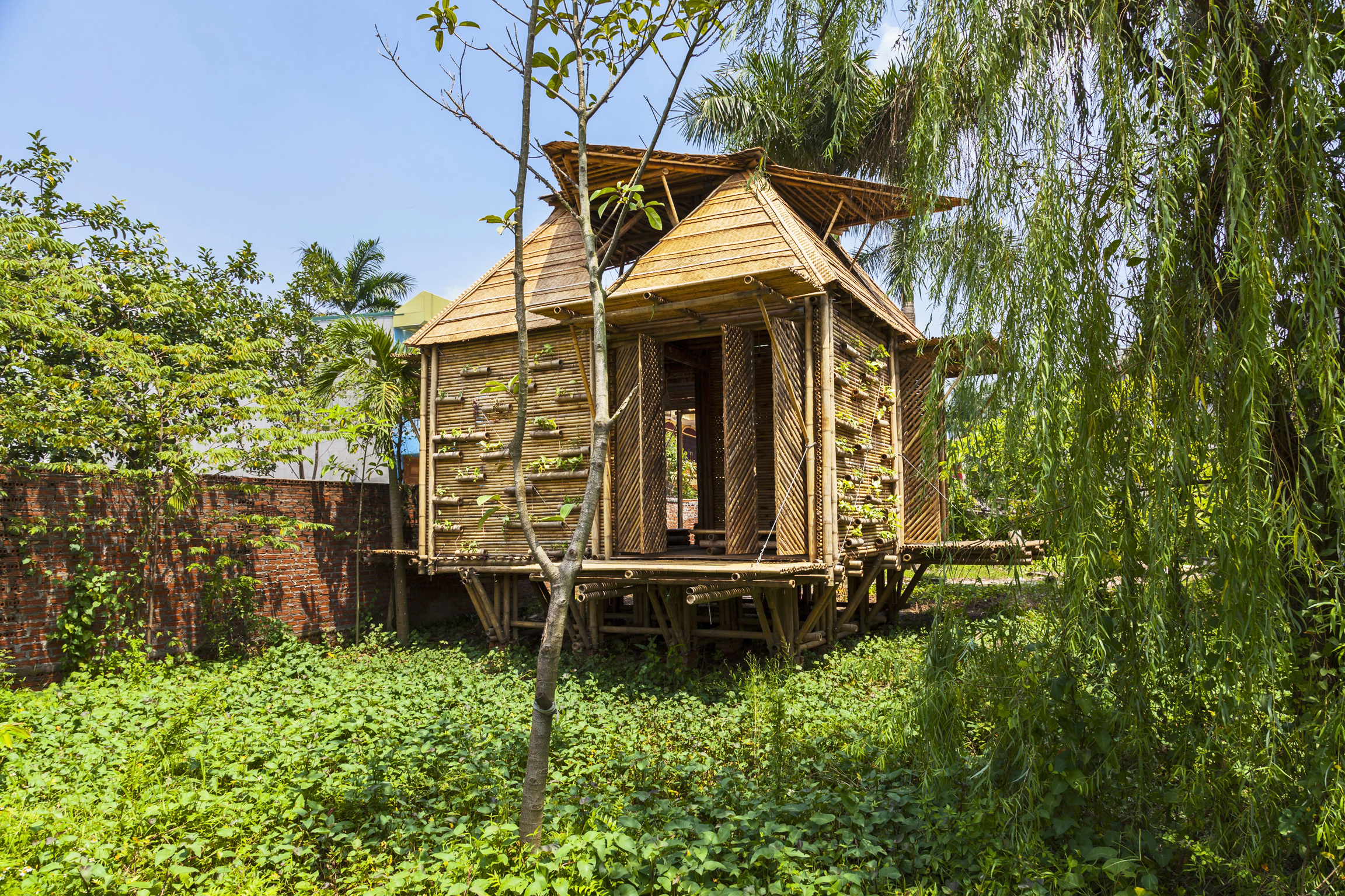 Designed by Vietnam-based H&amp;P Architects as an affordable concept home for villagers in some of the country’s most flood-prone ­regions—it costs just $2,500 to build—the Blooming Bamboo Home's bottom layer can be filled with reused oil drums that allow it to float in wet conditions, while steel beams keep it anchored.