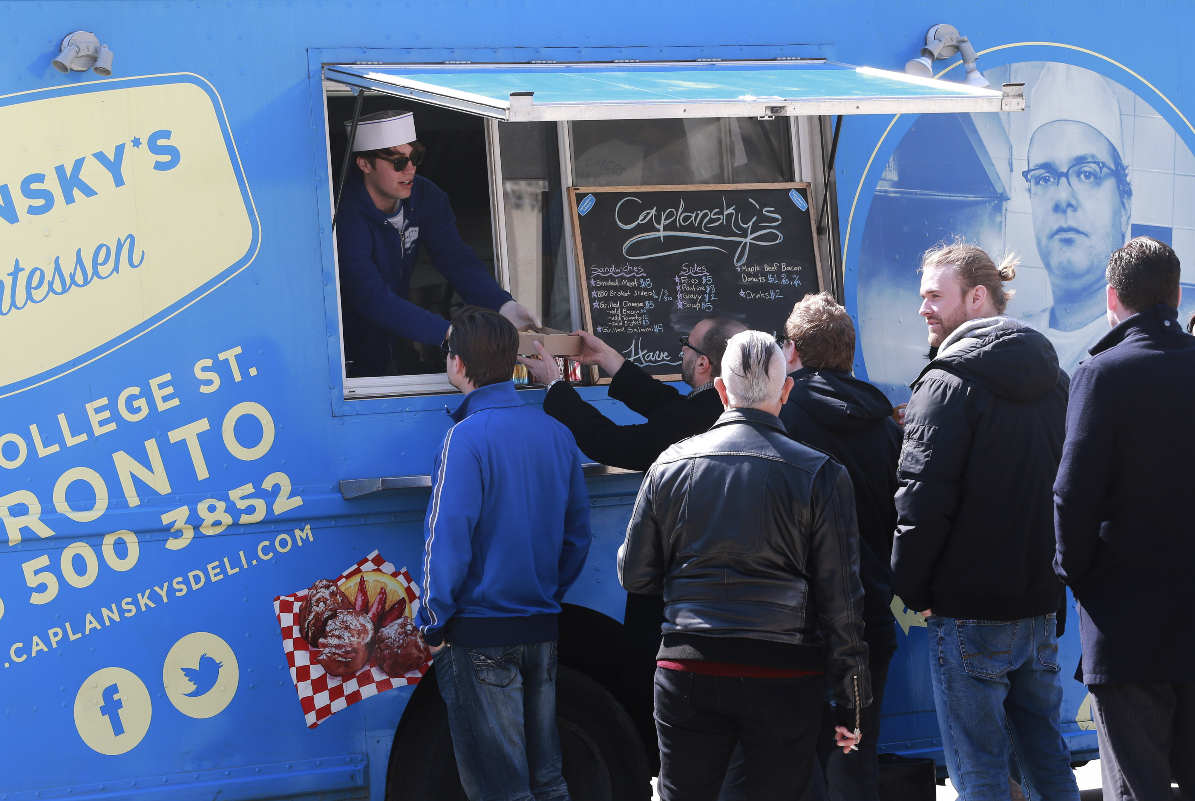 Food trucks gather at Nathan Phillips Square in Toronto on April 2, 2014. (Andrew Francis —Toronto Star/Getty Images)