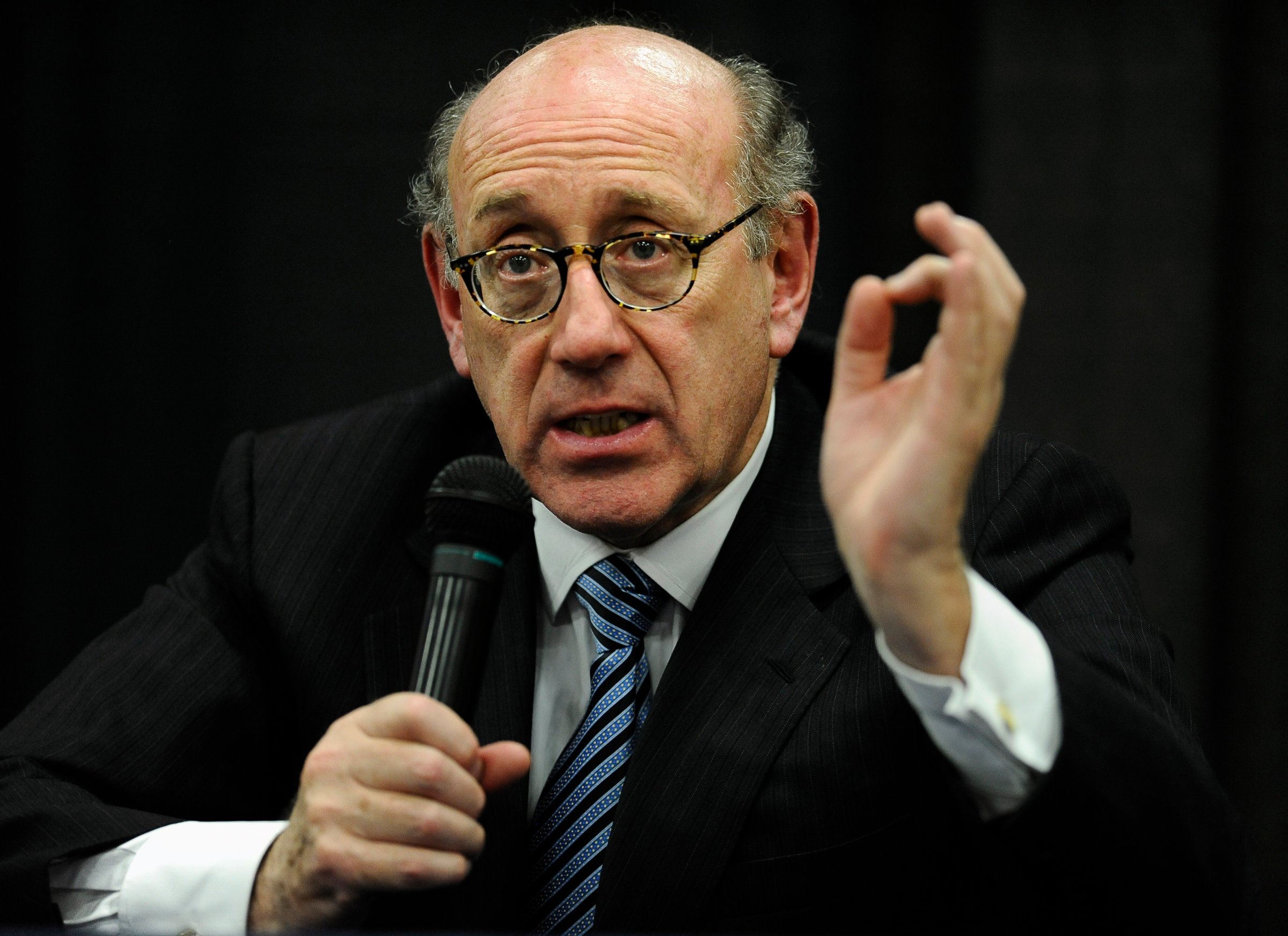 Attorney and special adviser Kenneth Feinberg speaks at a public forum on the distribution of Newtown donations at Edmond Town Hall in Newtown, Conn. on July 11, 2013.