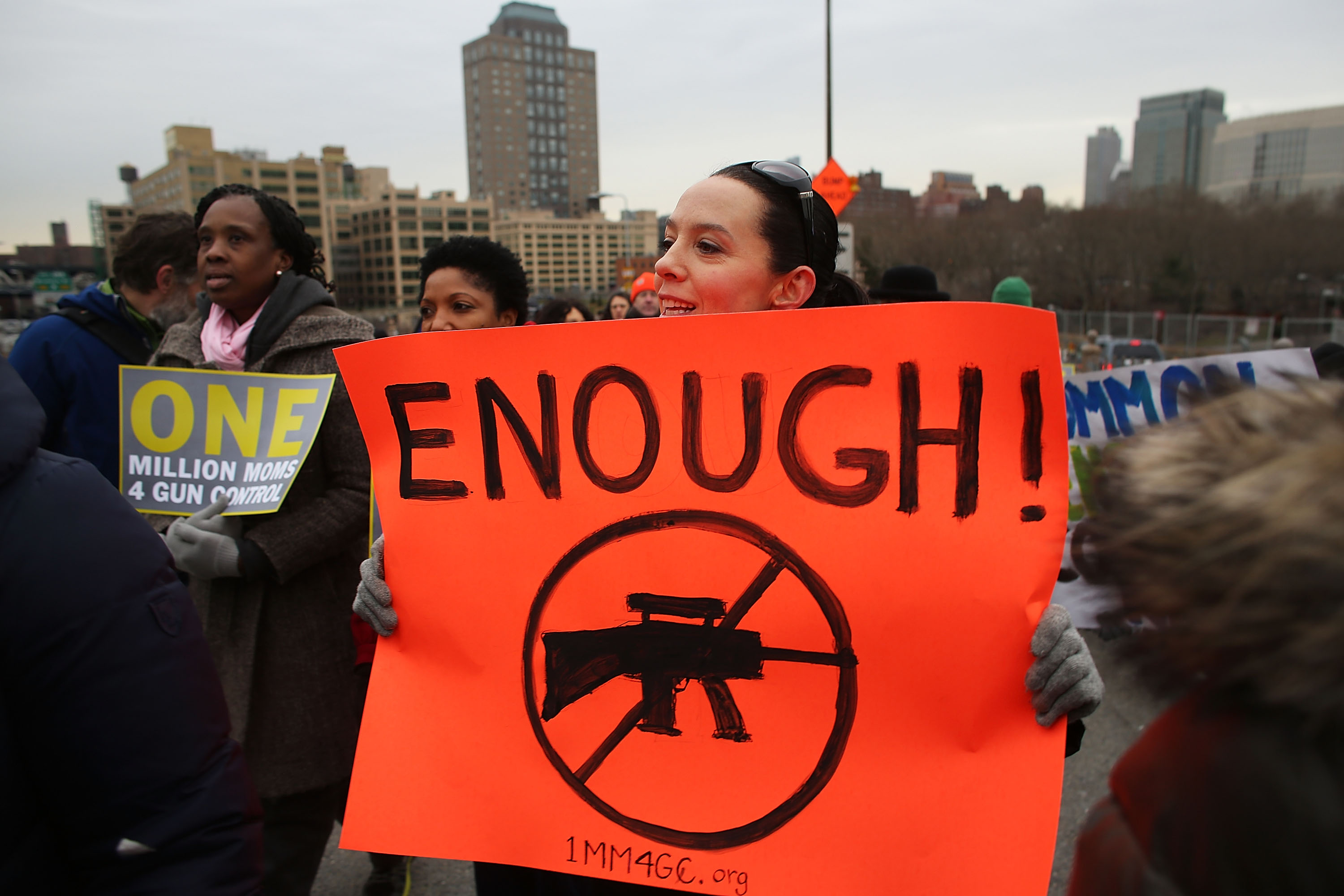Gun control activists march across Brooklyn Bridge