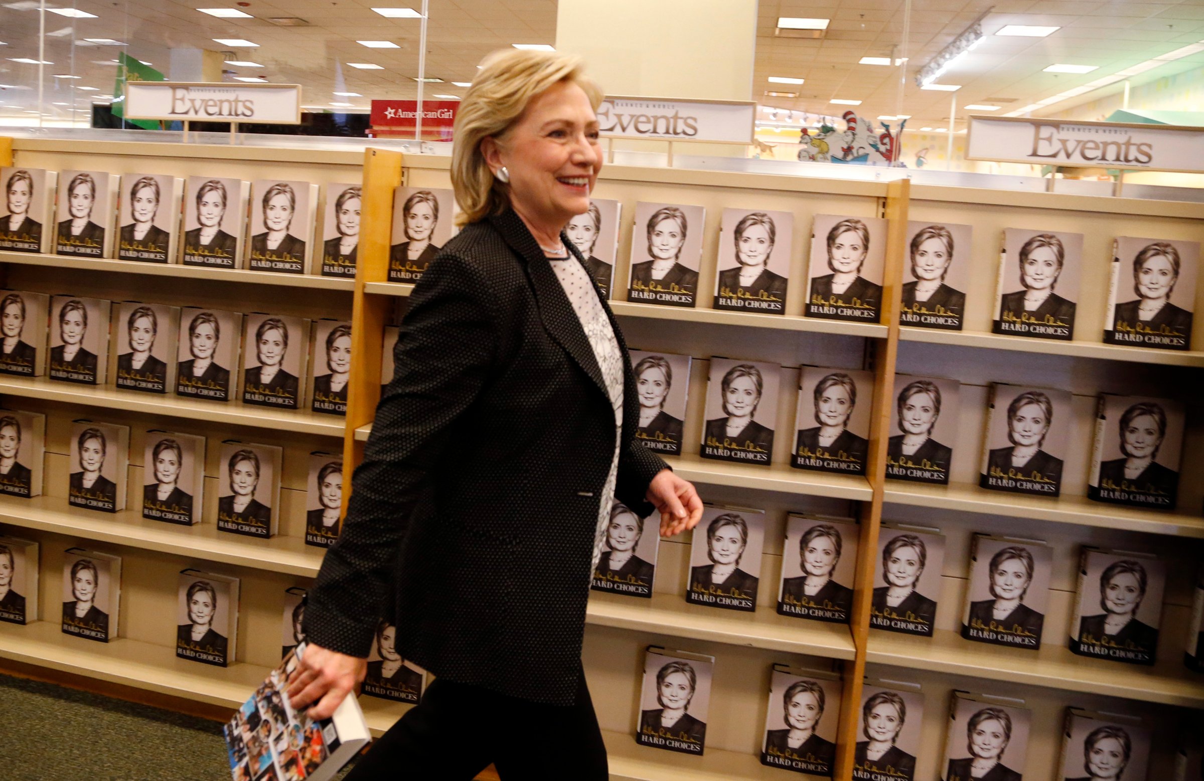 Former U.S. Secretary of State Hillary Clinton arrives to sign copies of her book "Hard Choices" at a Barnes & Noble book store in Los Angeles