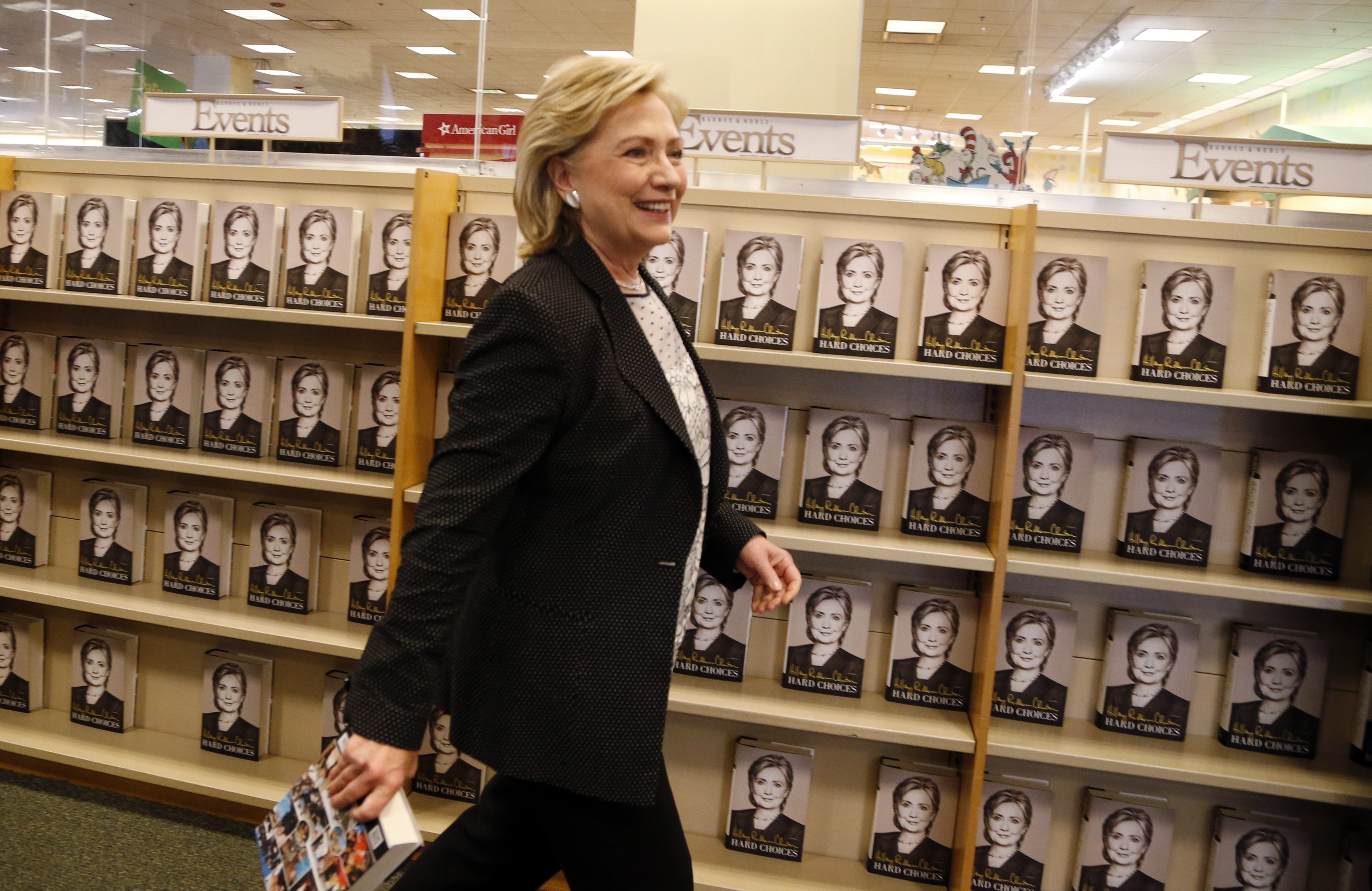 Former U.S. Secretary of State Hillary Clinton arrives to sign copies of her book "Hard Choices" at a Barnes &amp; Noble book store in Los Angeles
