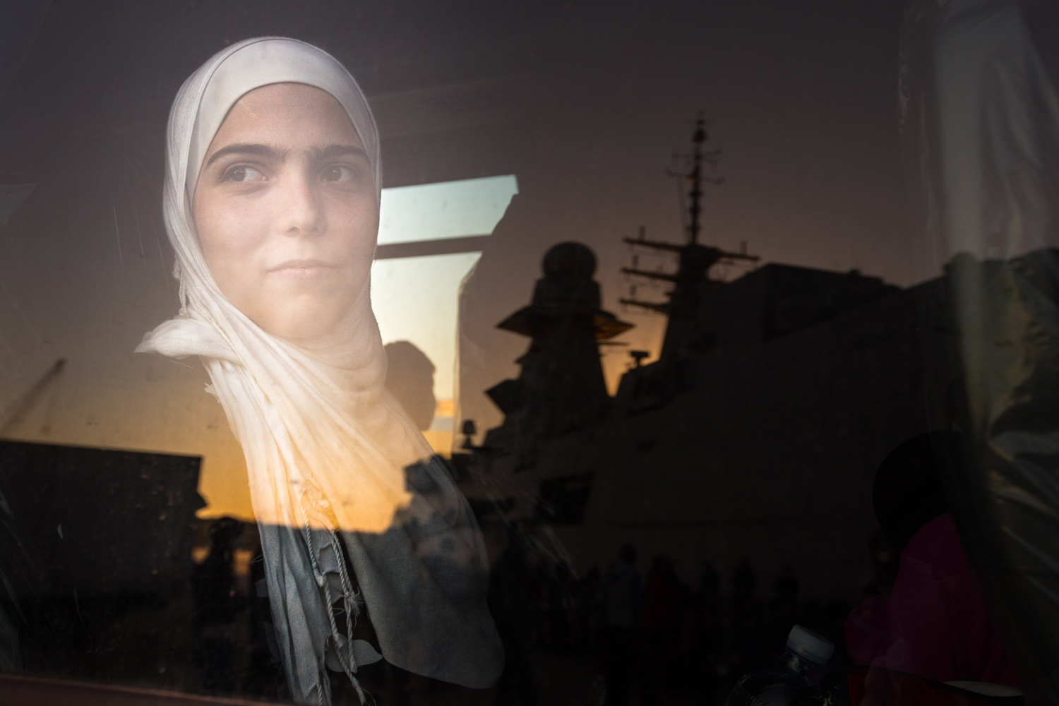 Syrian refugees on an Italian navy ship after being rescued from a fishing vessel carrying 443 Syrian asylum seekers, June 5, 2014. (Massimo Sestini—Polaris)