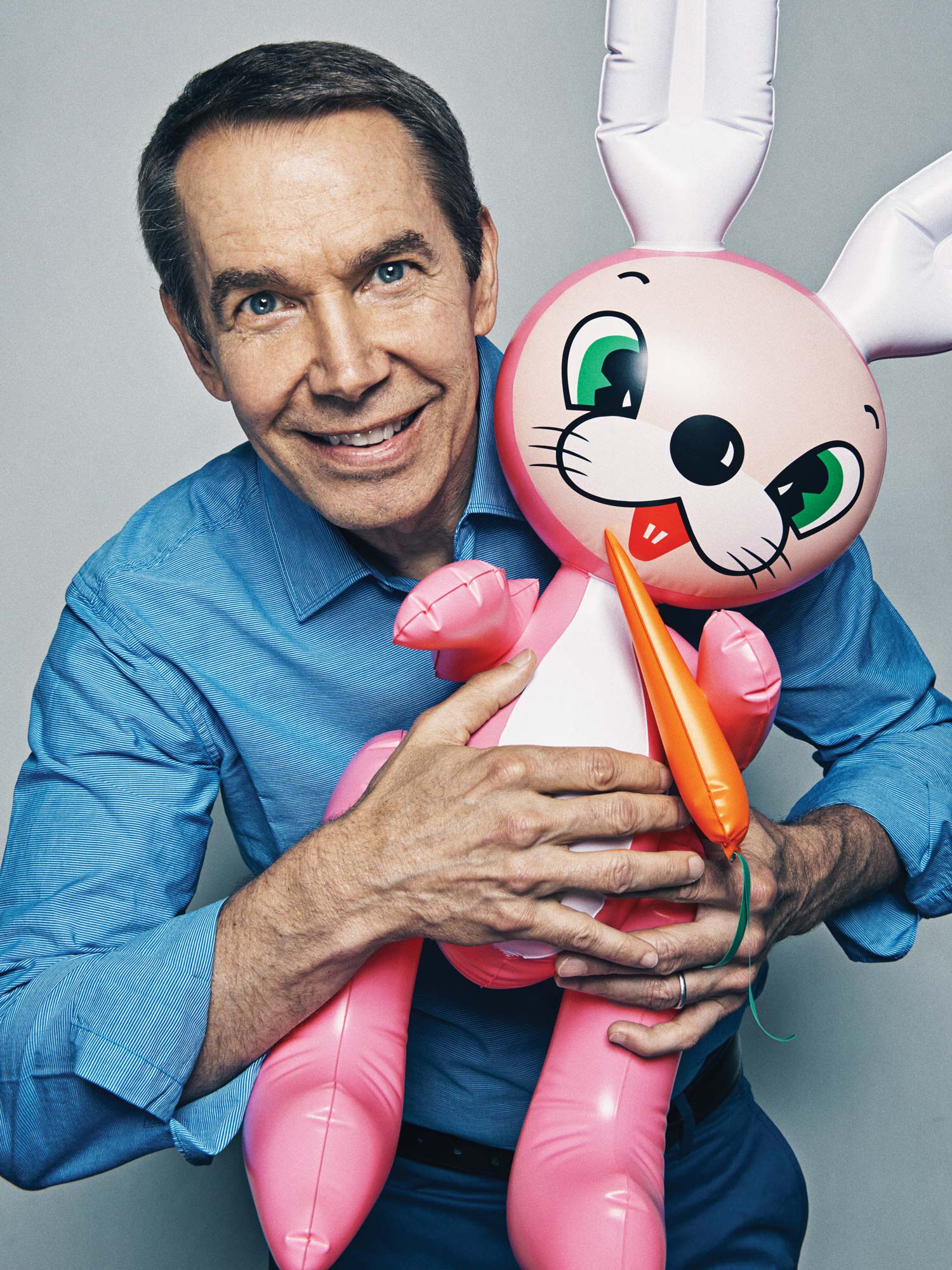 <strong>PUFF PIECE</strong>
                      <em>Koons with an inflatable rabbit of the kind he used in some of his earliest exhibited readymades</em> (Sebastian Kim for TIME)