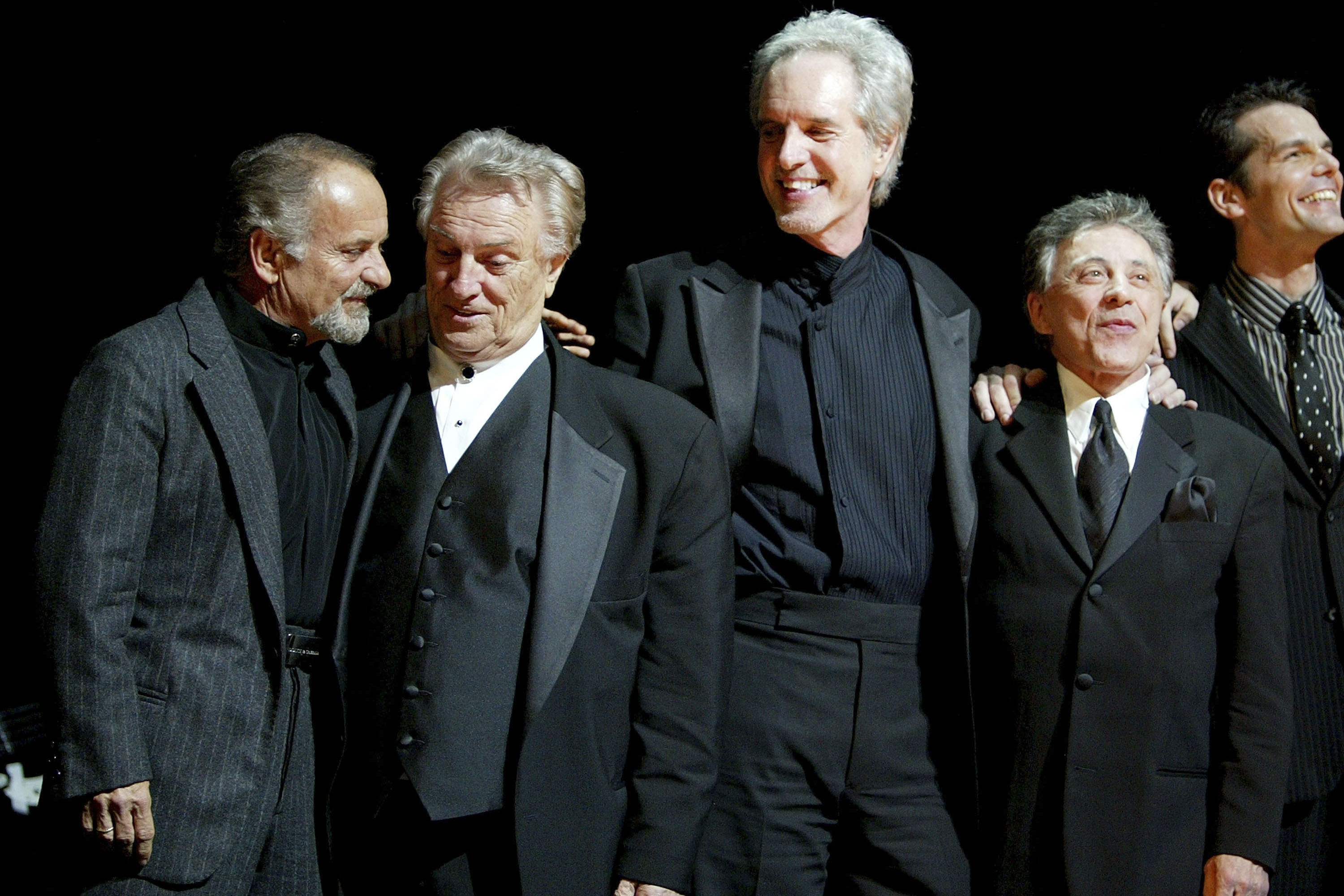 (L to R) Actor Joe Pesci joins Tommy DeVito, Bob Gaudio and Frankie Valli of Frankie Valli and the Four Seasons onstage during the curtain call at the play opening night of 