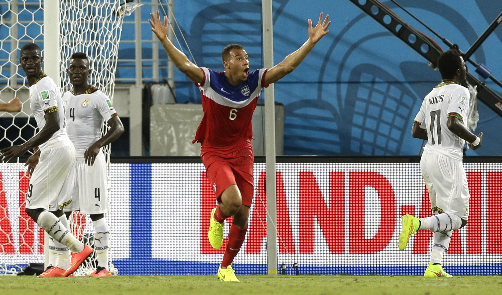 United States' John Brooks celebrates after scoring his side's second goal during the group G World Cup soccer match between Ghana and the United States at the Arena das Dunas in Natal, Brazil on June 16, 2014. (Ricardo Mazalan—AP)