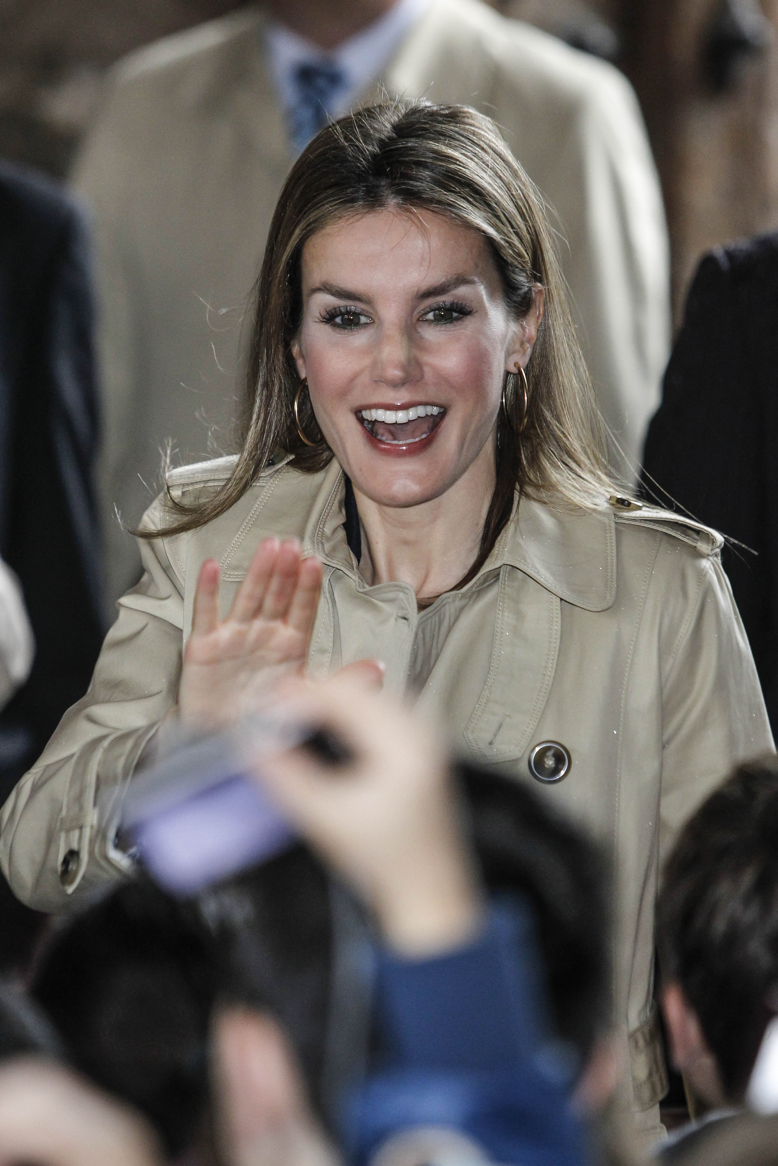 Princess Letizia of Spain waves to photographers at a seminar on Spanish language in journalism in San Millan de la Cogolla, Spain on May 28, 2014.
