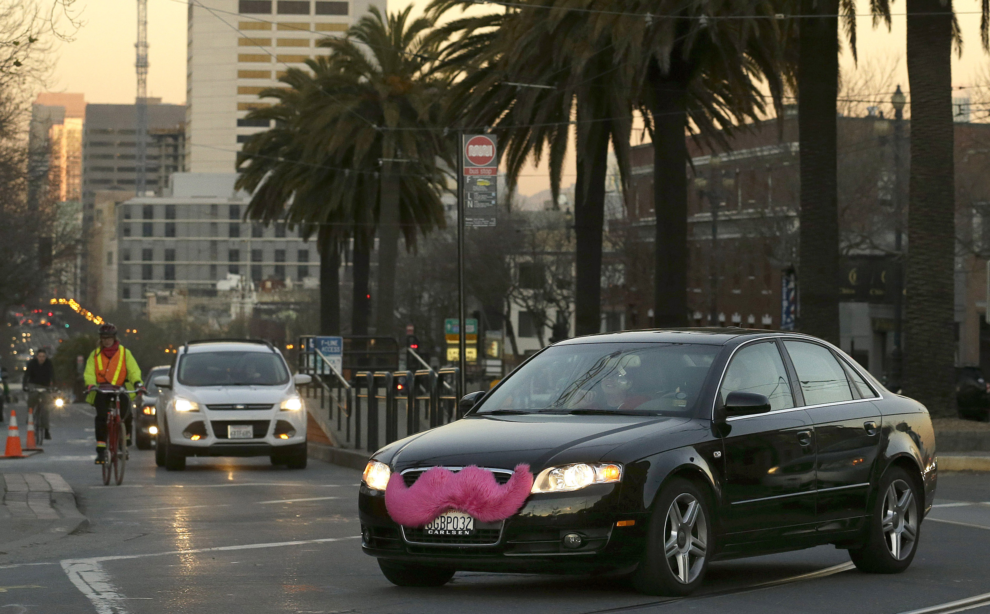 A Lyft car crosses Market Street in San Francisco, Jan. 17, 2013. (Jeff Chiu—AP)