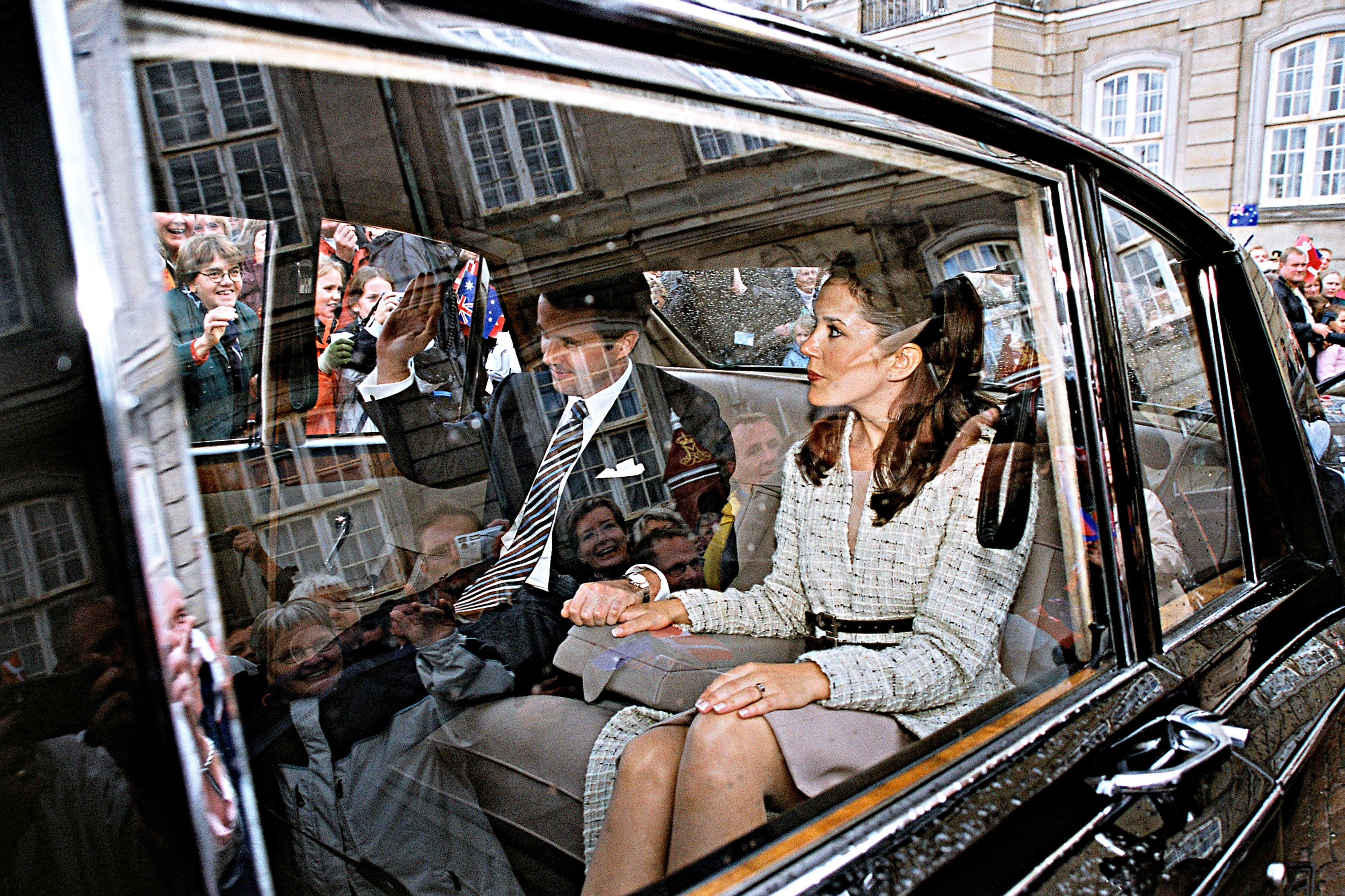 Crown Prince Frederik of Denmark and Mary Elizabeth Donaldson drive off after their engagement at Copenhagen's Amalienborg Palace on  October 8, 2013.