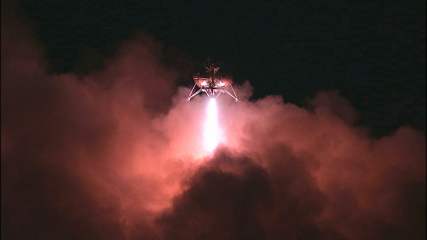 NASA's Morpheus prototype lander and Autonomous Landing Hazard Avoidance Technology, or ALHAT, successfully completes a test landing at the Kennedy Space Center in Florida on May 28, 2014.