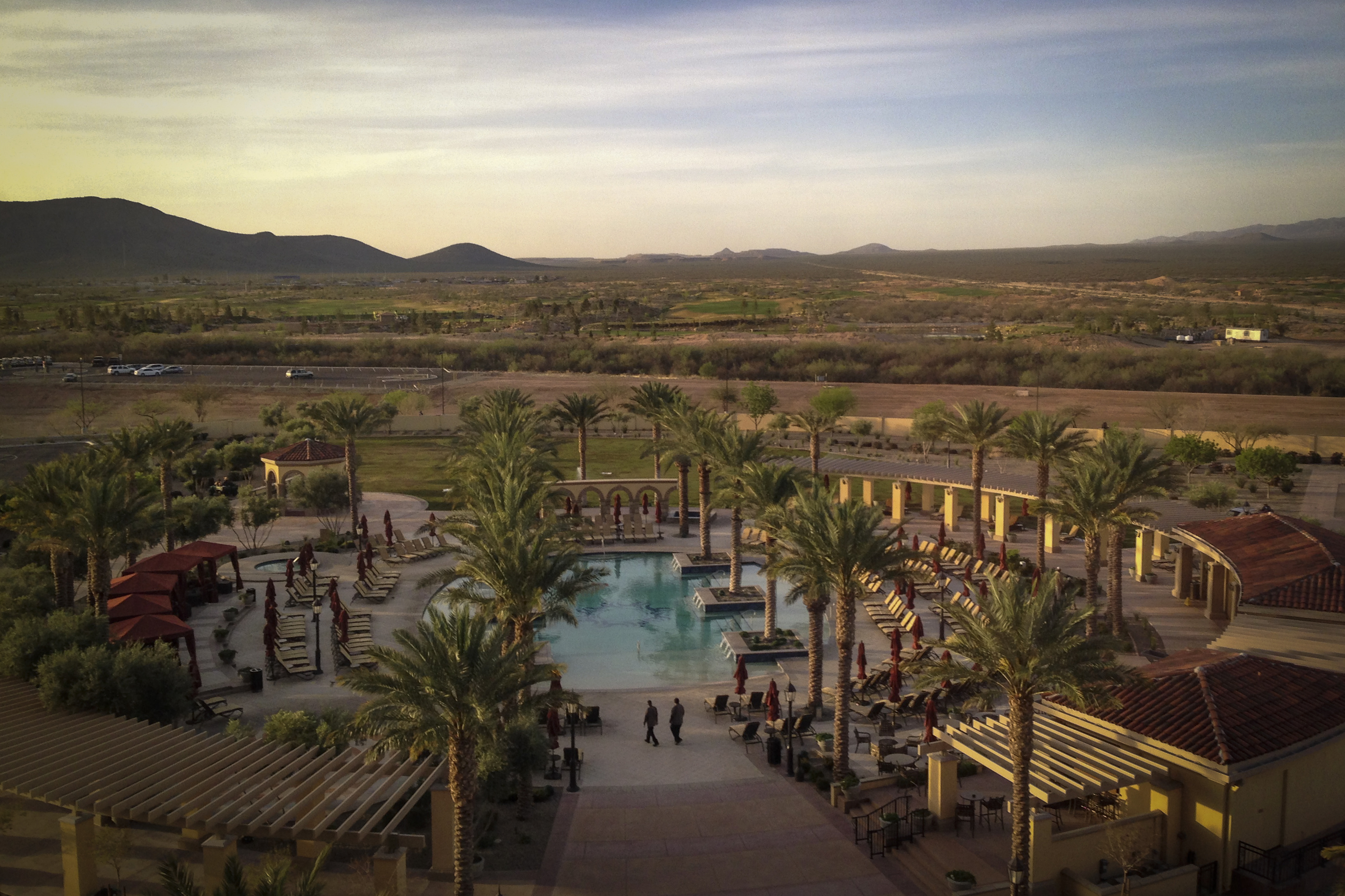 The grounds of the Casino Del Sol Hotel, hinting of an oasis, overlooks the poverty stricken residential part of the tribal land on the Pascua Yaqui Indian Reservation, Ariz., March 18, 2014