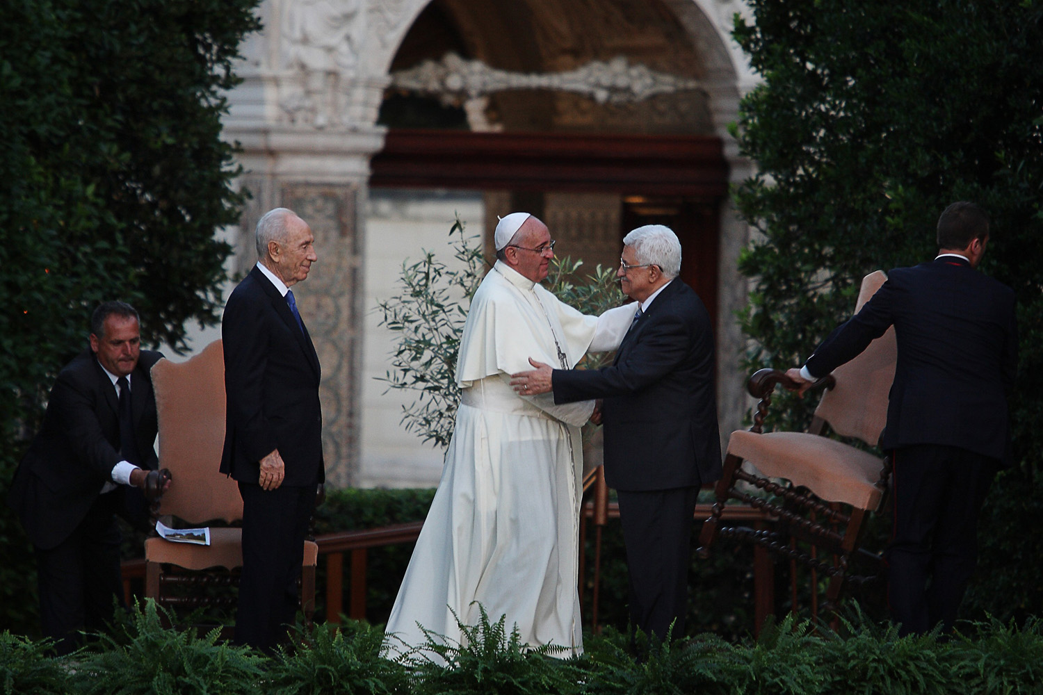 Pope Francis (C) with Palestinian leader Mahmud Abbas (R) and Israeli President Shimon Peres during a joint peace prayer at the Vatican Gardens in Vatican City, Rome on June 8, 2014.