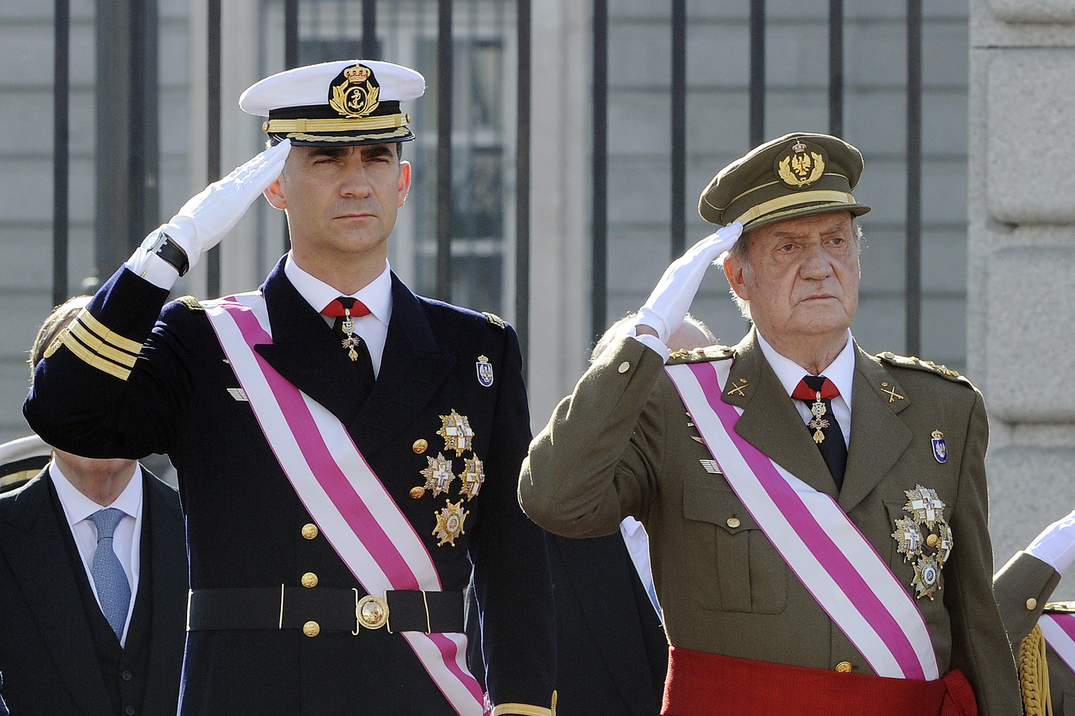 Spain's Crown Prince Felipe and Spain's King Juan Carlos salute Spain's Queen Sofia during the Pascua Militar ceremony at the Royal Palace in Madrid on January 6, 2014. (Dominique Faget—AFP/Getty Images)