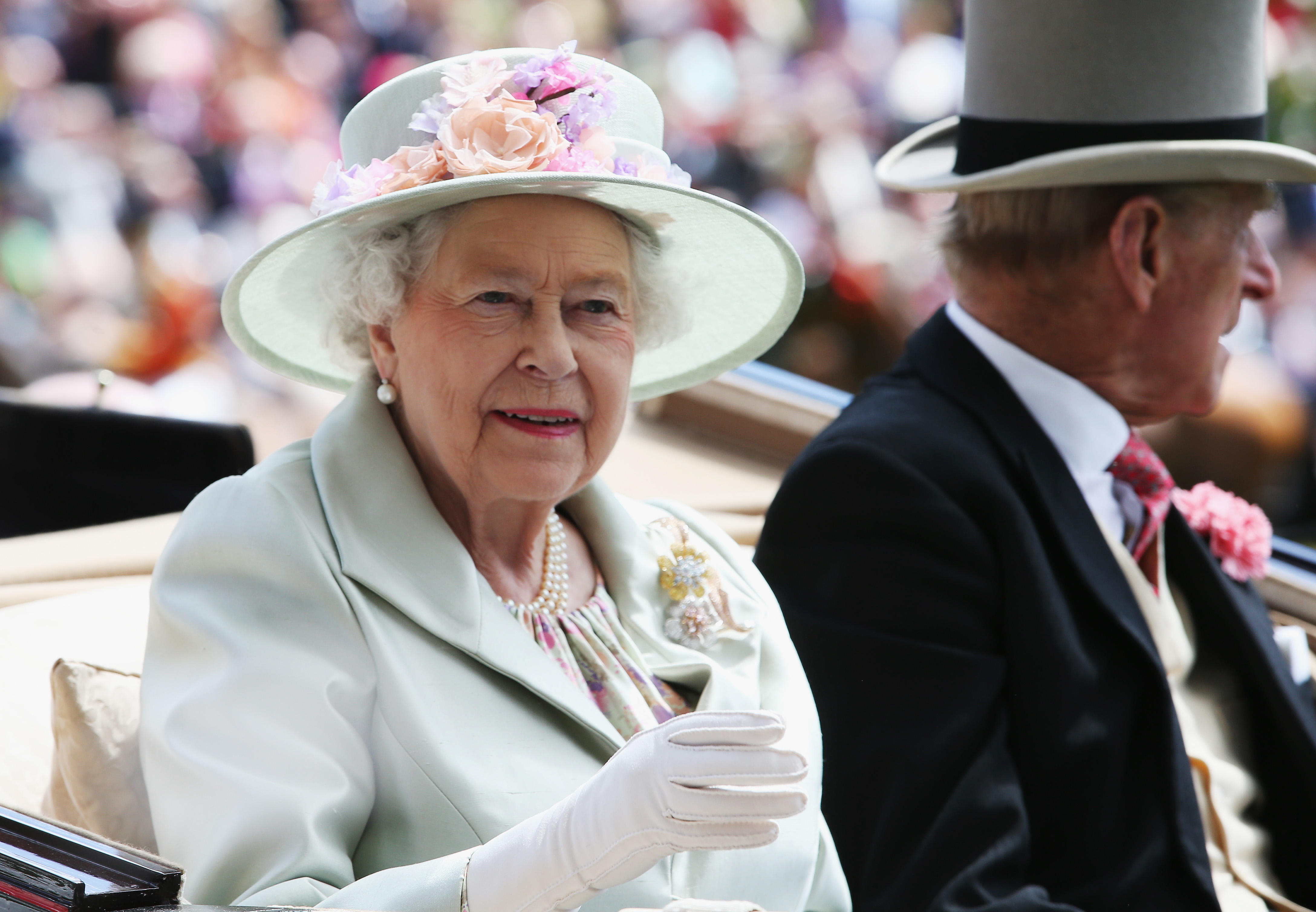 Queen Elizabeth II and Prince Philip, Duke of Edinburgh attend day two of Royal Ascot at Ascot Racecourse on June 18, 2014 in Ascot, England. (Chris Jackson -- Getty Images)