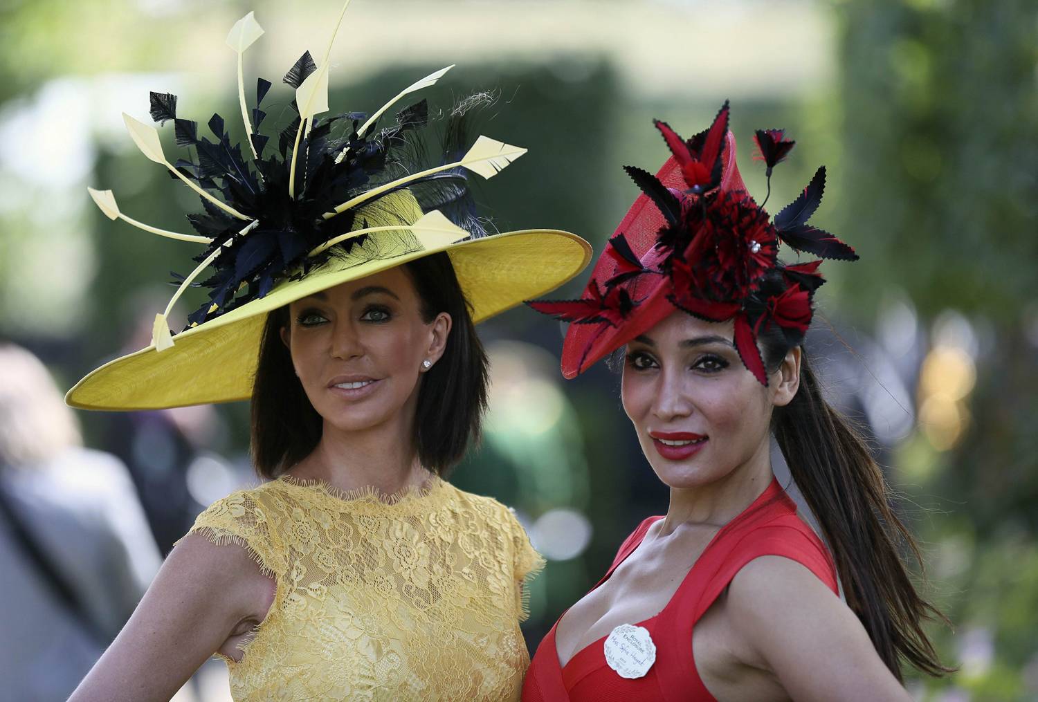 Racegoers pose on the first day of the Royal Ascot horse racing festival at Ascot, June 17, 2014.