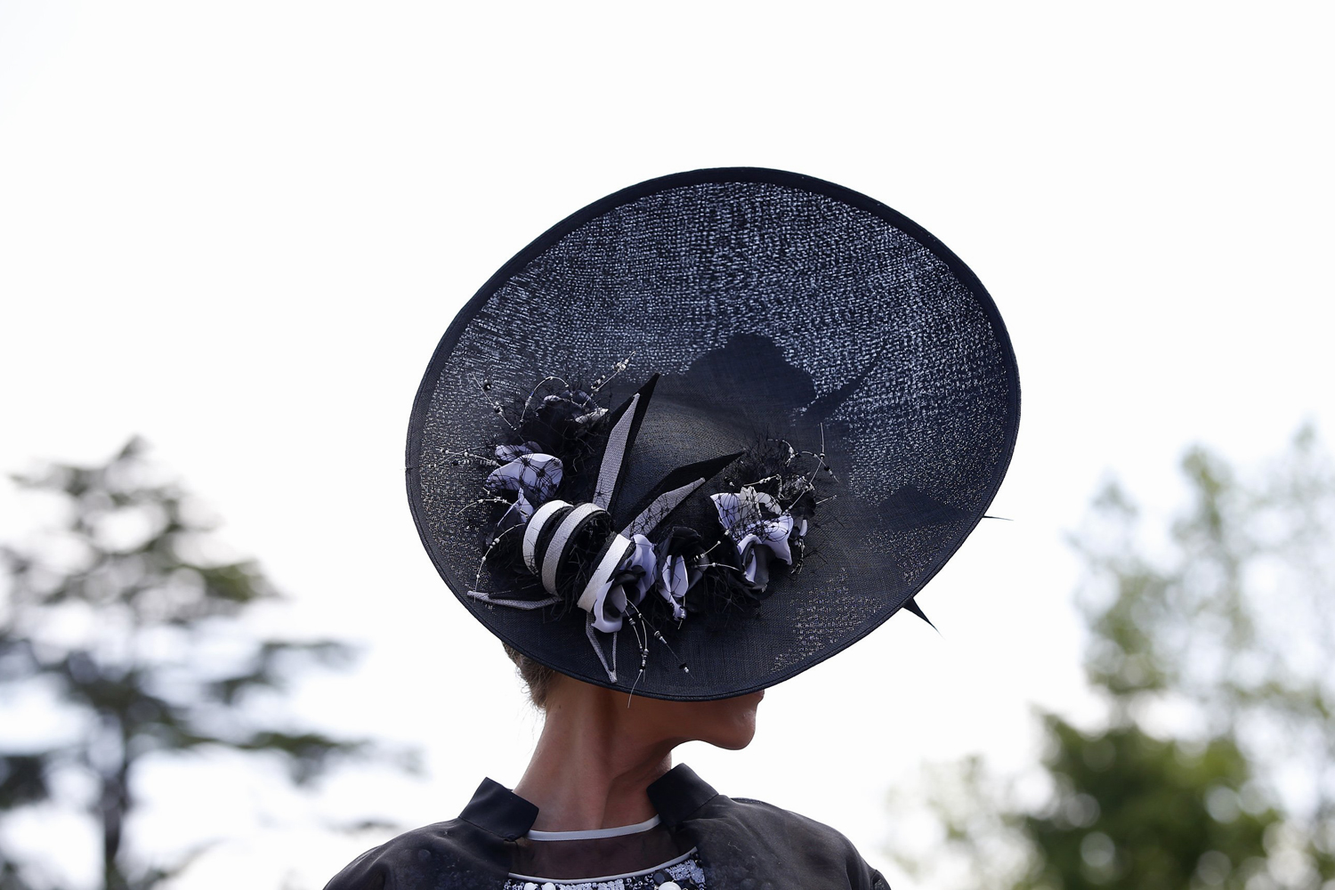 Milnda Strudwick wears an ornate hat on the first day of the Royal Ascot horse racing meeting at Ascot, June, 17, 2014.