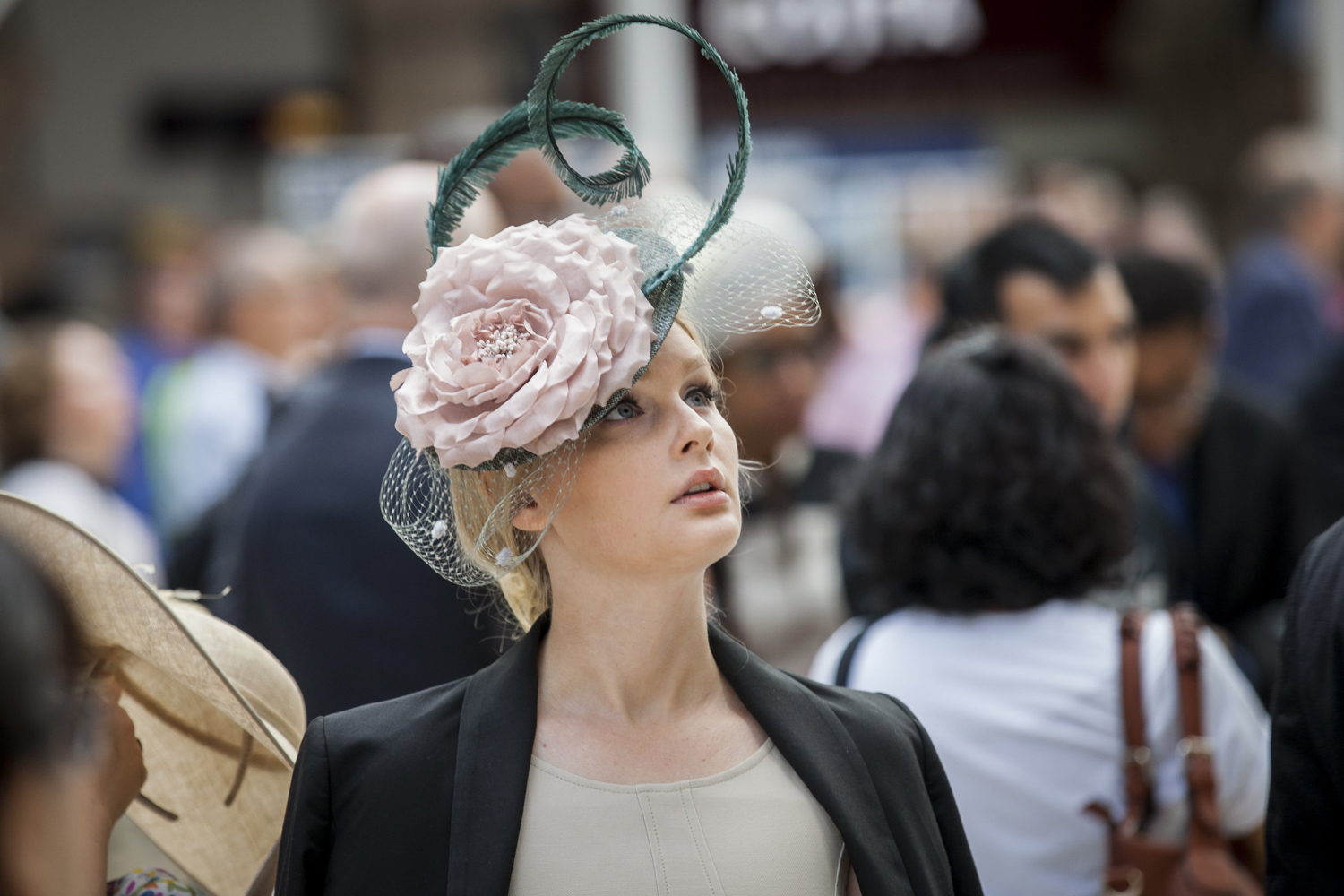 Racegoer about to travel by train from Waterloo station to Ascot racecourse to attend Royal Ascot on June 17, 2014 in London.