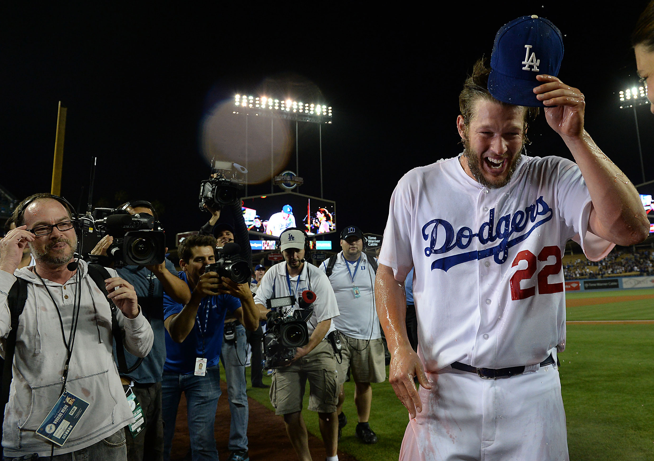 Los Angeles Dodgers starting pitcher Clayton Kershaw (22) reacts after being dunked with Powerade as he gives an interview following his no hitter against the Colorado Rockies at Dodger Stadium. Dodgers won 8-0. (USA Today Sports/Reuters)