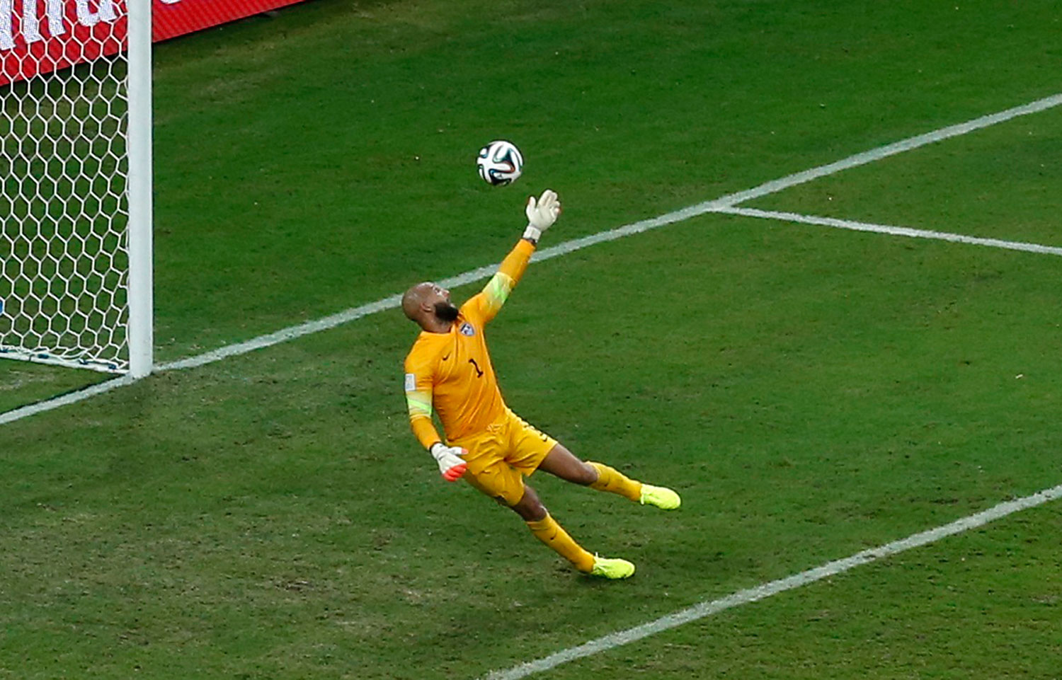 Tim Howard of the U.S. saves a shot by Portugal's Eder.