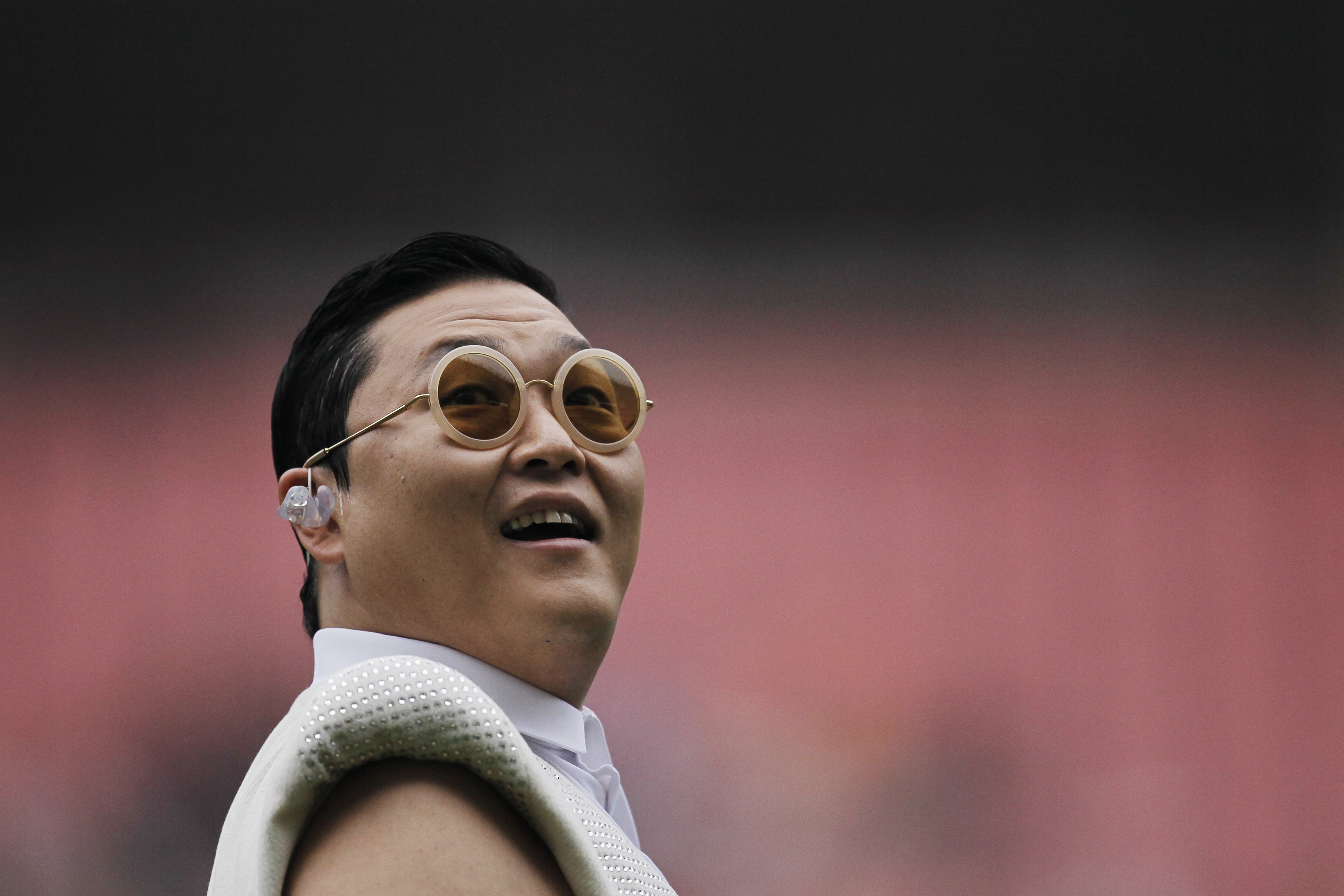 South Korean singer Psy performs during a charity soccer match in Shanghai on June 23, 2013 (Aly Song—Reuters)