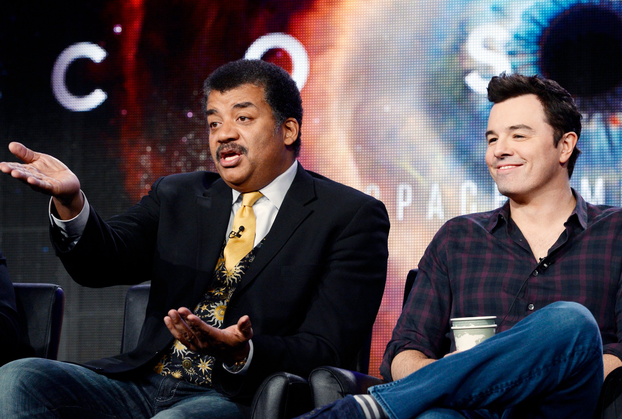 Host Neil DeGrasse Tyson and Seth MacFarlane, executive producer of "Cosmos", participate in Fox Broadcasting Company's part of the Television Critics Association (TCA) Winter 2014 presentations in Pasadena