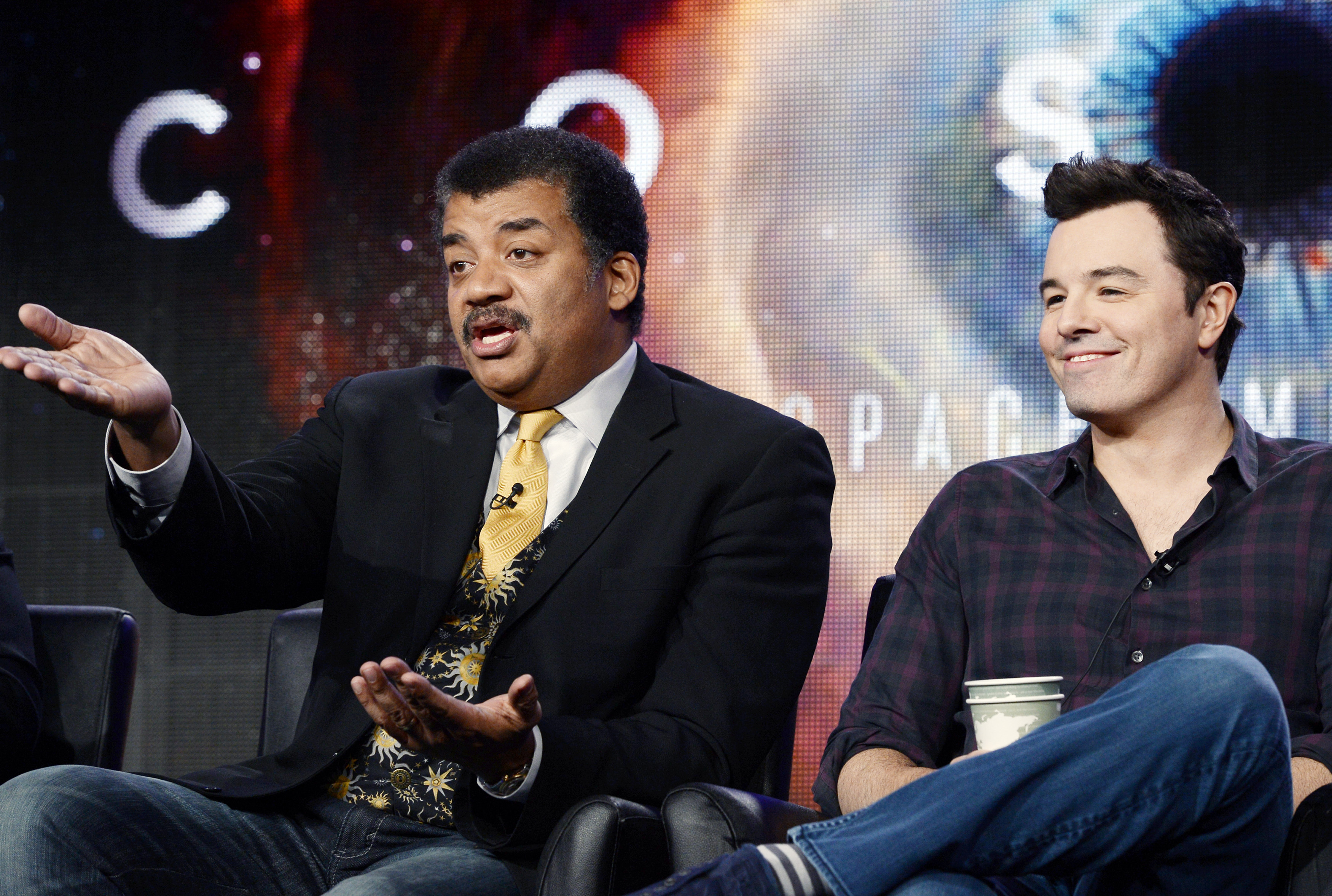 Host Neil deGrasse Tyson, left, and Seth MacFarlane, executive producer of <i>Cosmos</i>, participate in Fox Broadcasting Company's part of the Television Critics Association (TCA) Winter 2014 presentations in Pasadena, Calif., on Jan. 13, 2014 (Kevork Djansezian—Reuters)