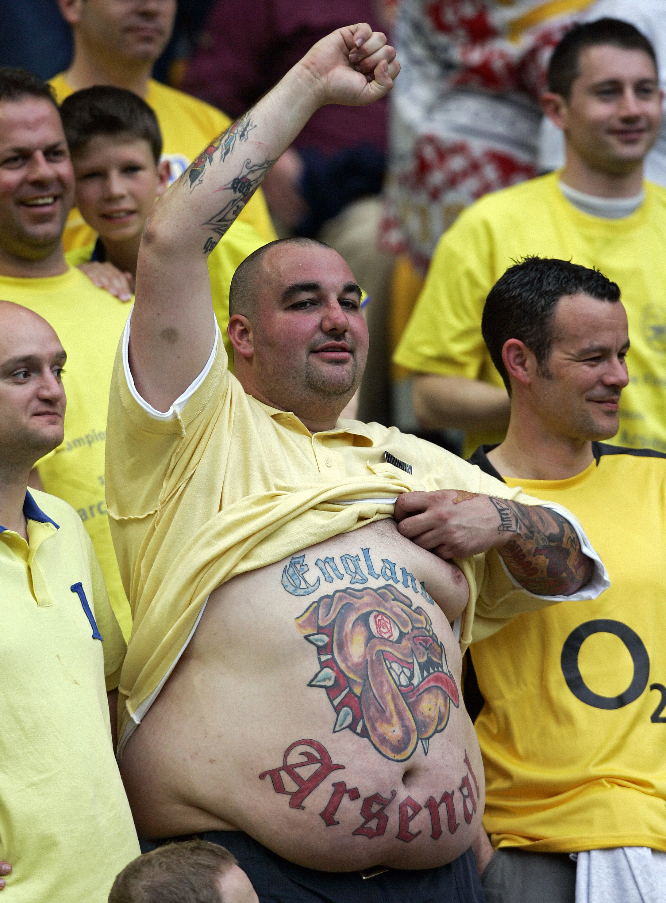 An Arsenal fan shows his tattoo before the Champions League final soccer match against at the Stade de France in Saint Denis, France on May 17, 2006.