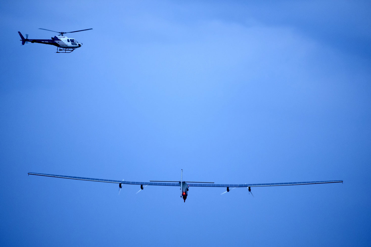 German test pilot Markus Scherdel steers Solar Impulse 2 on its maiden flight from its base in Payerne on June 2, 2014.