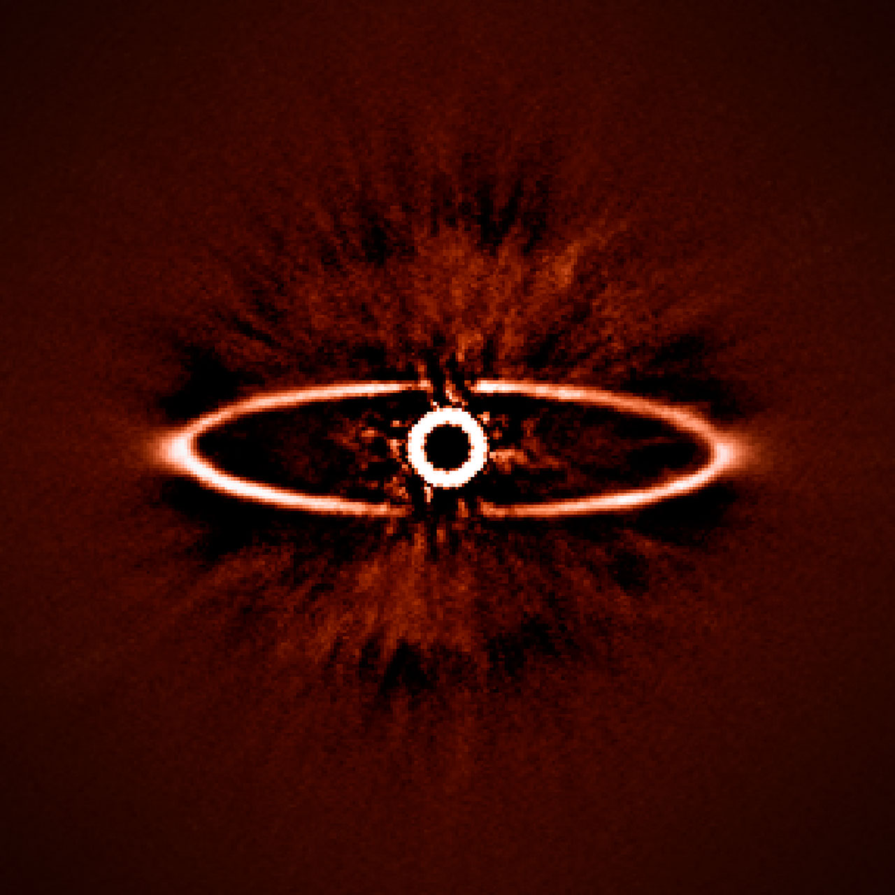 This infrared image shows the dust ring around the nearby star HR 4796A in the southern constellation of Centaurus and was one of the first produced by the SPHERE instrument in May 2014.