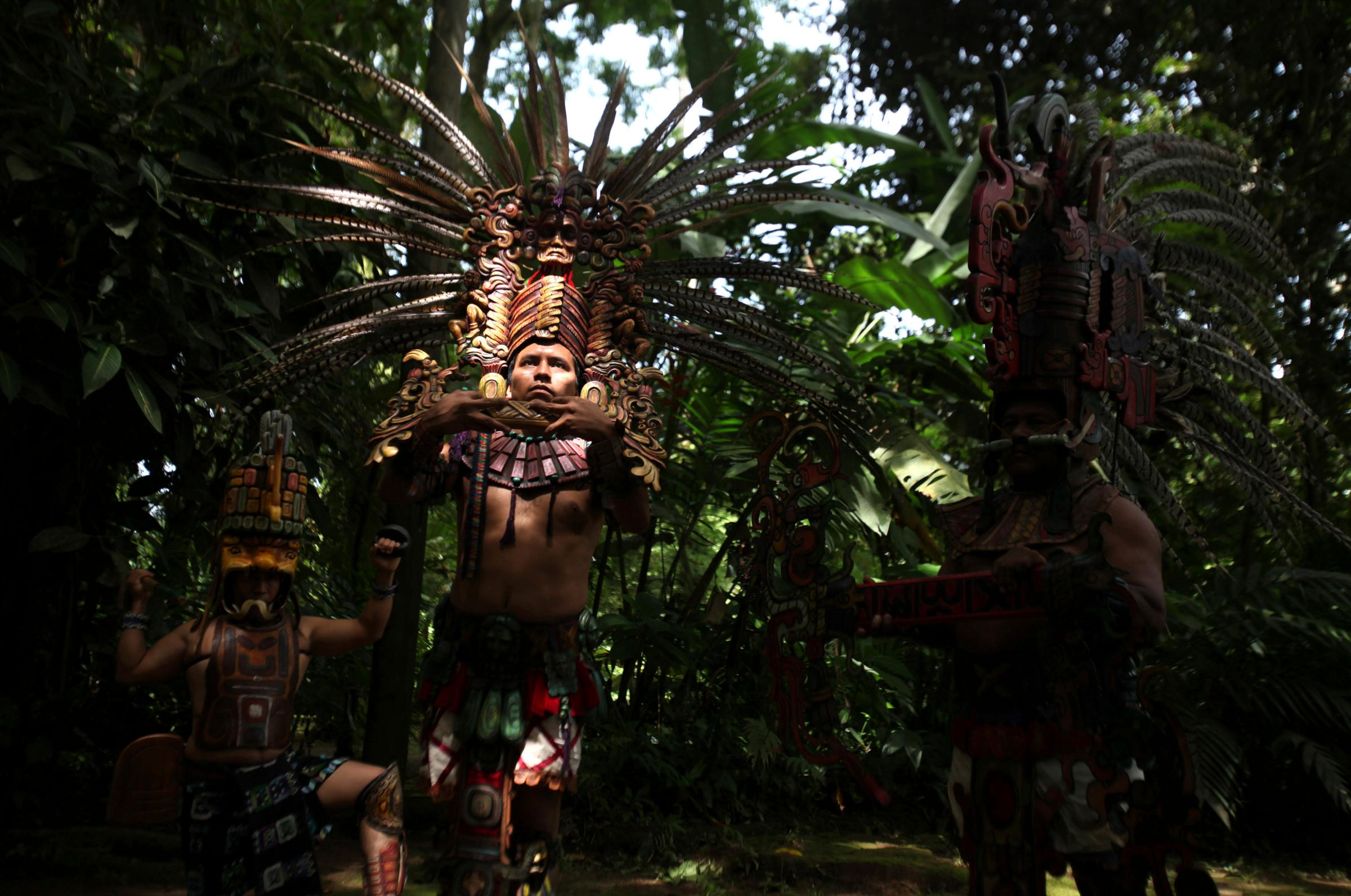 Performers participate in a pre-hispanic dance to celebrate the beginning of the Summer Solstice during the inauguration of a museum at the archaeological site of Tak'Alik A'Baj in Retalhuleu