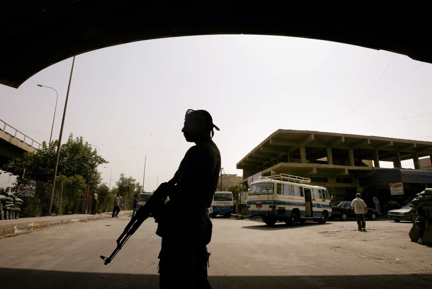 A member of the U.S.-backed Neighborhood Patrol Awakening Council stands guard in the Sunni Adhamiya district north of Baghdad in 2008. (Wathiq Khuzaie—Getty Images)