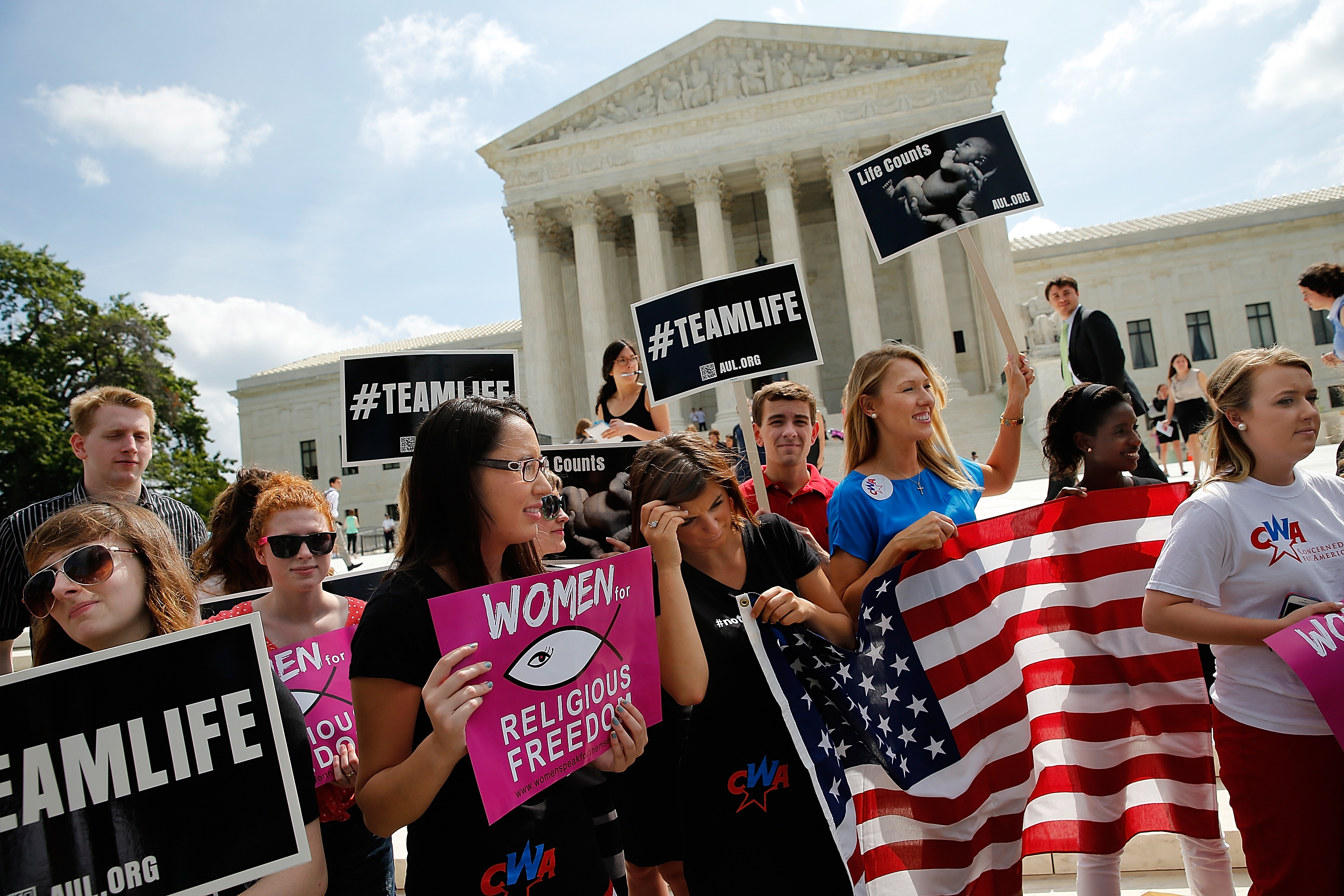 Pro-life activists gather outside the U.S. Supreme Court June 26, 2014 in Washington, DC. (Win McNamee—Getty Images)