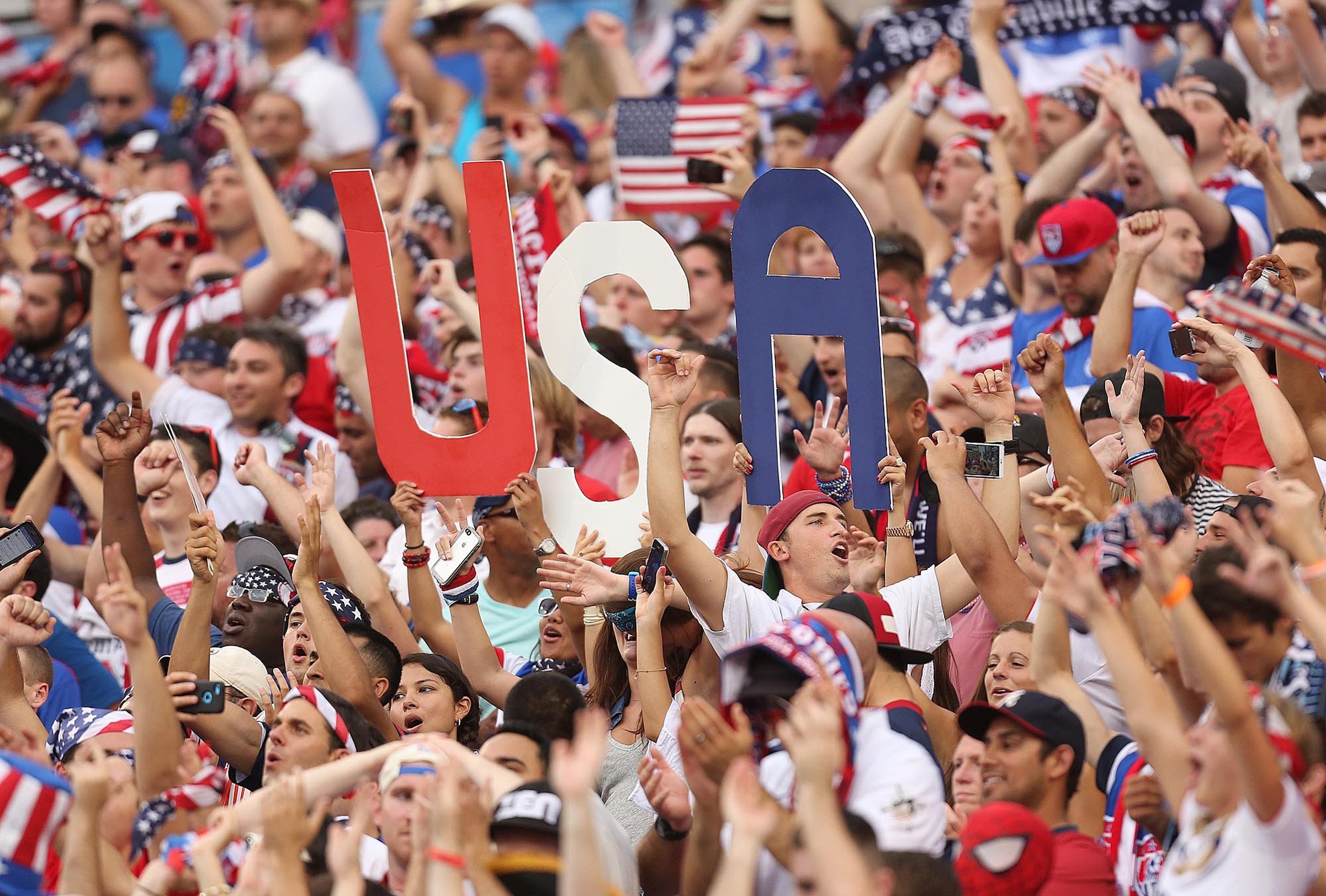 Fans celebrate during the United States' 2-1 win against Nigeria in a friendly in preparation for the World Cup, at EverBank Field in Jacksonville, Fla., on Saturday, June 7, 2014. (Stephen M. Dowell—Orlando Sentinel/MCT/ Getty Images)