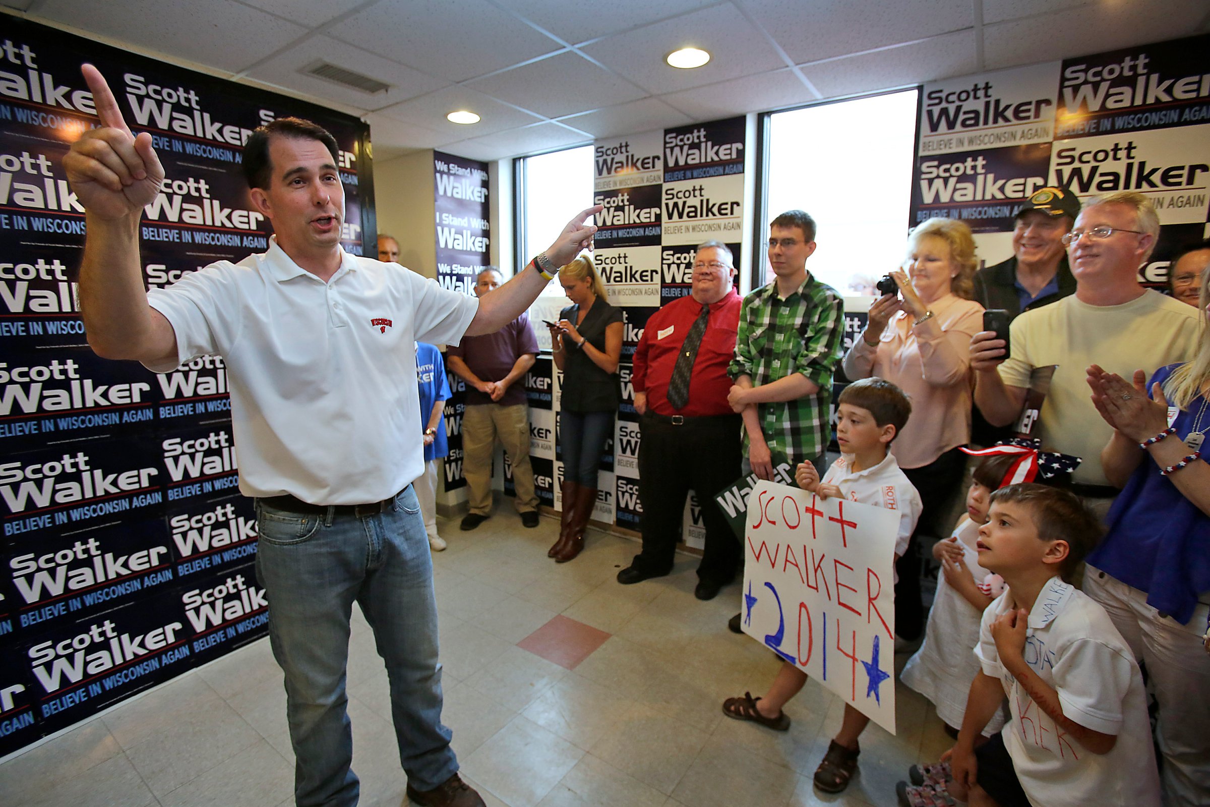 Wisconsin Governor Scott Walker makes a stop at the Republican Party of Wisconsin Appleton Headquarters Saturday, June 21, 2014 in Appleton, Wis.