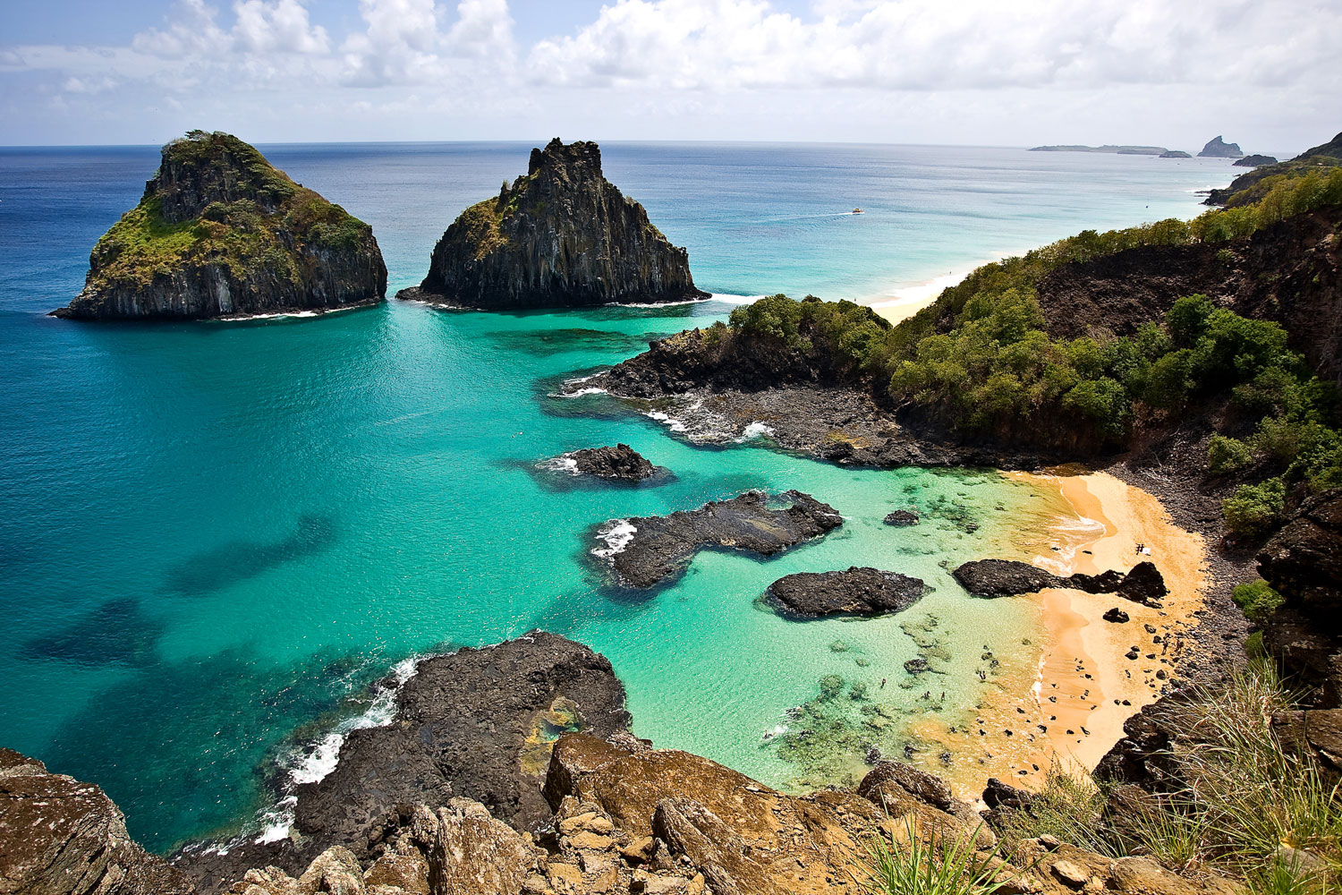 Fernando de Noronha, an archipelago of 21 islands about 200 miles off the Brazilian coast, is designated by UNESCO as a World Heritage Site and offers travelers stunning views of marine life.