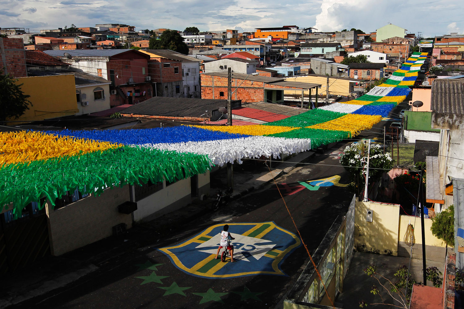 The Third Street of the Alvorada neighborhood, part of Brazil's southernmost state Rio Grande do Sul, is vibrantly decorated for the 2014 World Cup in Manaus, one of the tournament's 12 host cities.