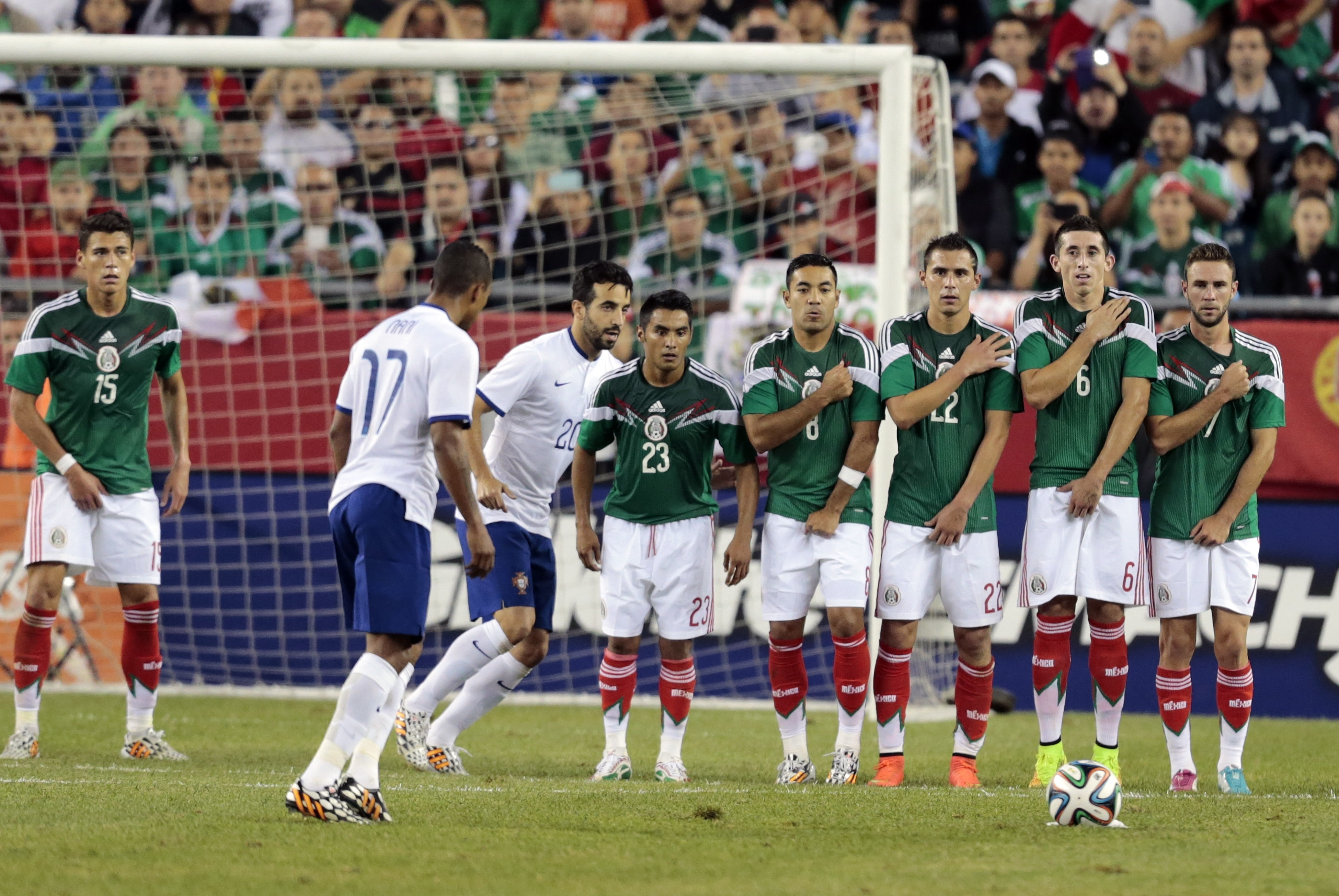 The Mexican wall waits for a free kick from Portugal's Nani (17) during an international friendly before the 2014 World Cup, Foxborough, Mass., June 6, 2014. (Fred Kfoury III—Icon SMI/Corbis)