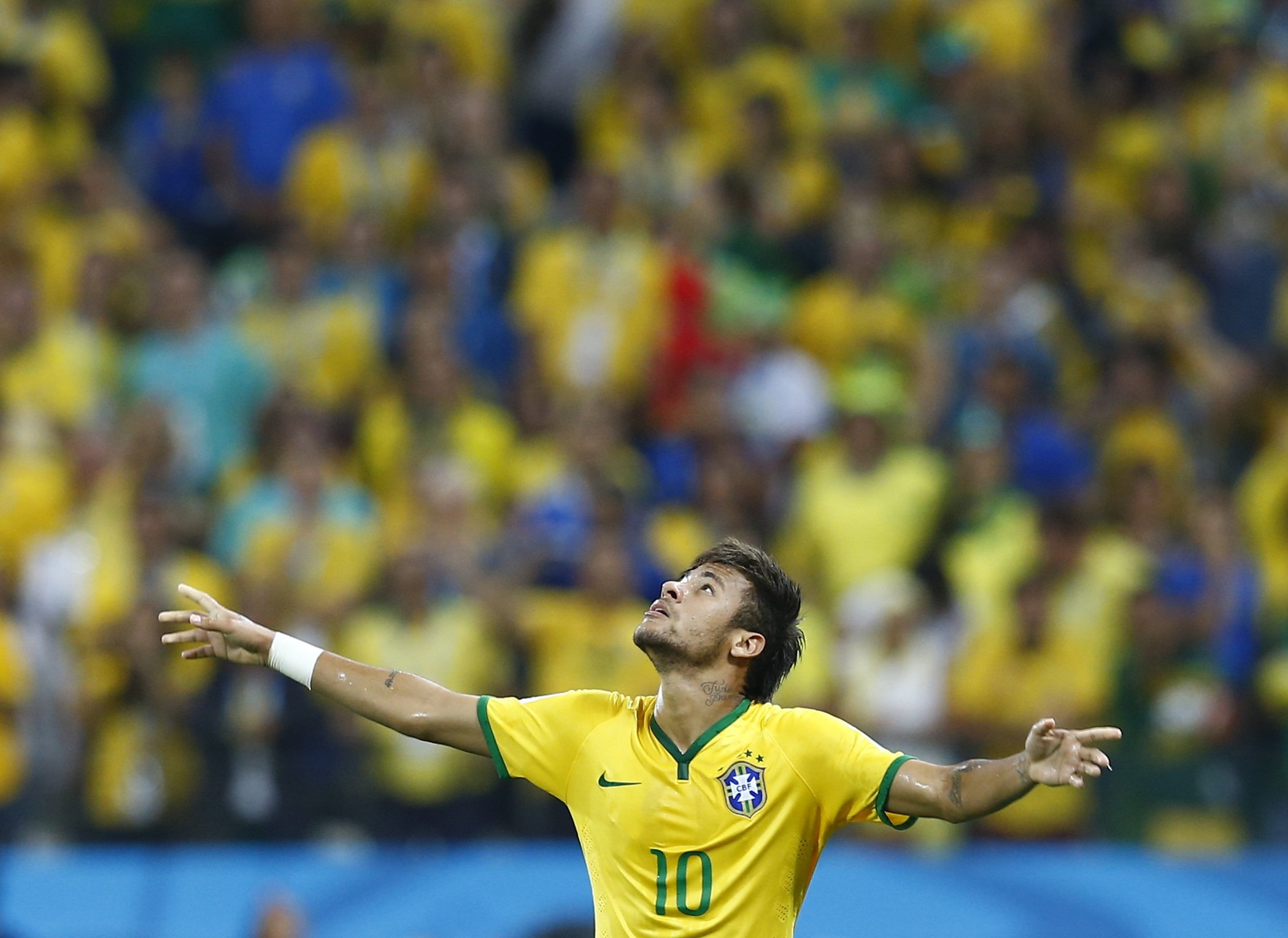 Brazil's Neymar celebrates a goal during the 2014 World Cup opening match between Brazil and Croatia at the Corinthians arena in Sao Paulo June 12, 2014.