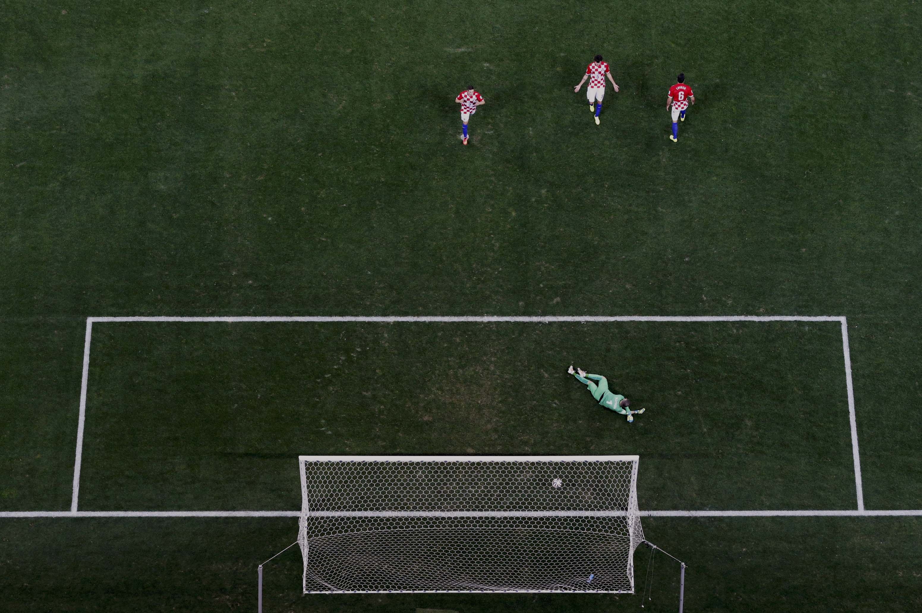 Croatia's players react after conceding a goal to Brazil's Oscar (unseen) during their 2014 World Cup opening match at the Corinthians arena in Sao Paulo on June 12, 2014.