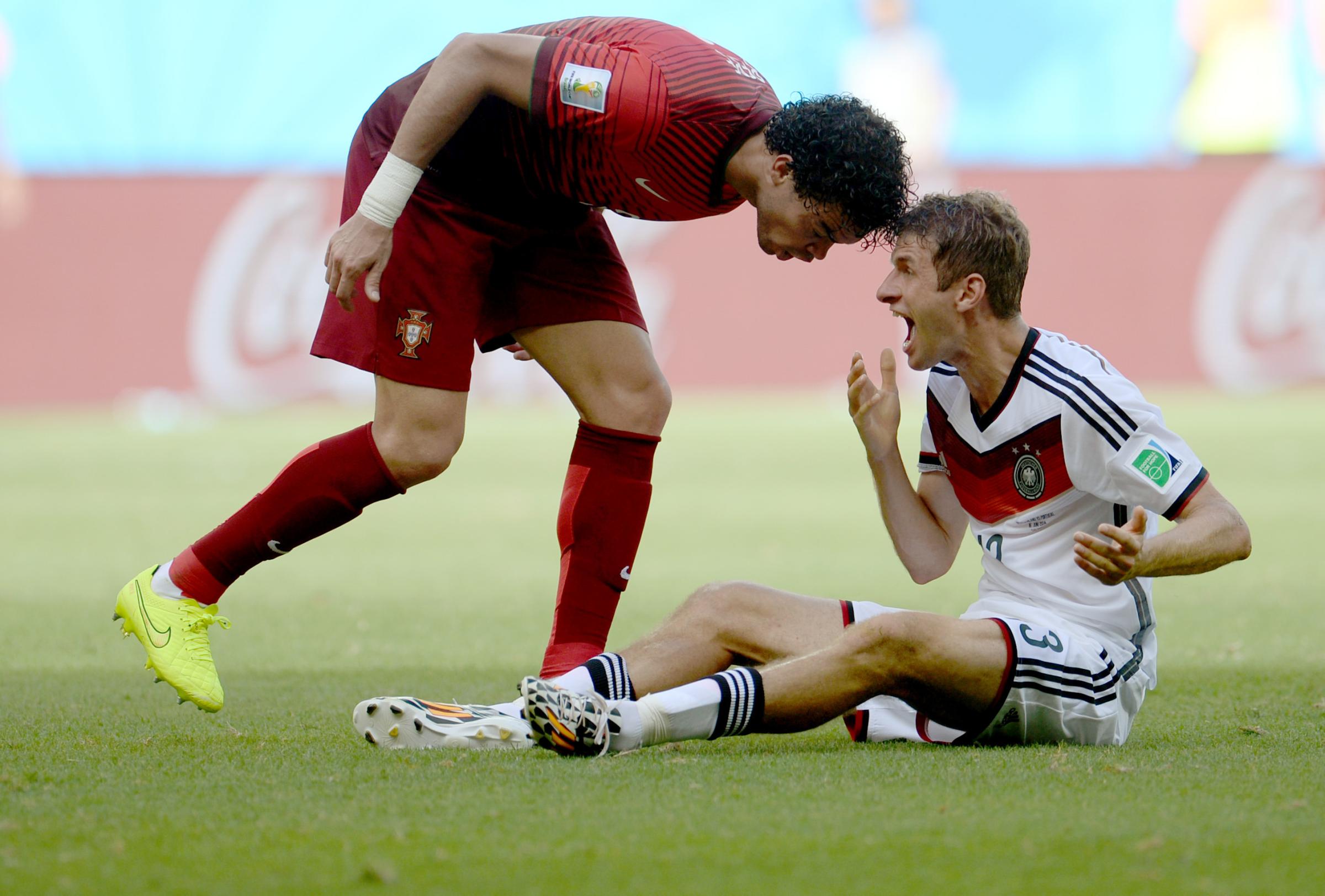 Pepe of Portugal argues with Thomas Müller of Germany and gives him a headbutt during to the FIFA World Cup 2014 group G preliminary round match between Germany and Portugal at the Arena Fonte Nova Stadium in Salvador da Bahia, Brazil on June 16, 2014.