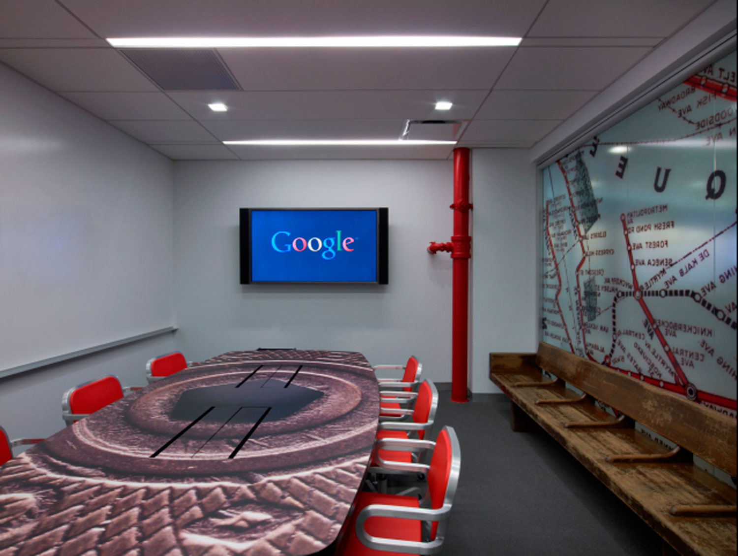 A subway themed conference room where Googlers can video conference with other Google offices around the world.