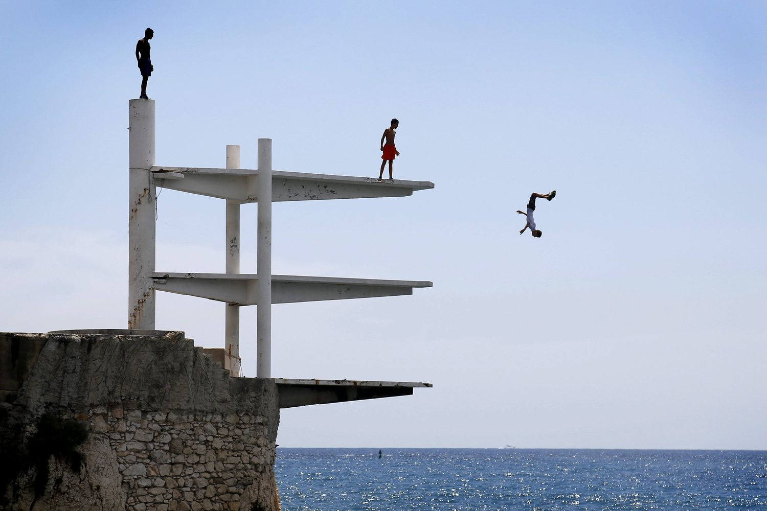 Jul. 21, 2014. People dive into the Mediterranean Sea on a hot summer's day in Nice, southern France.
