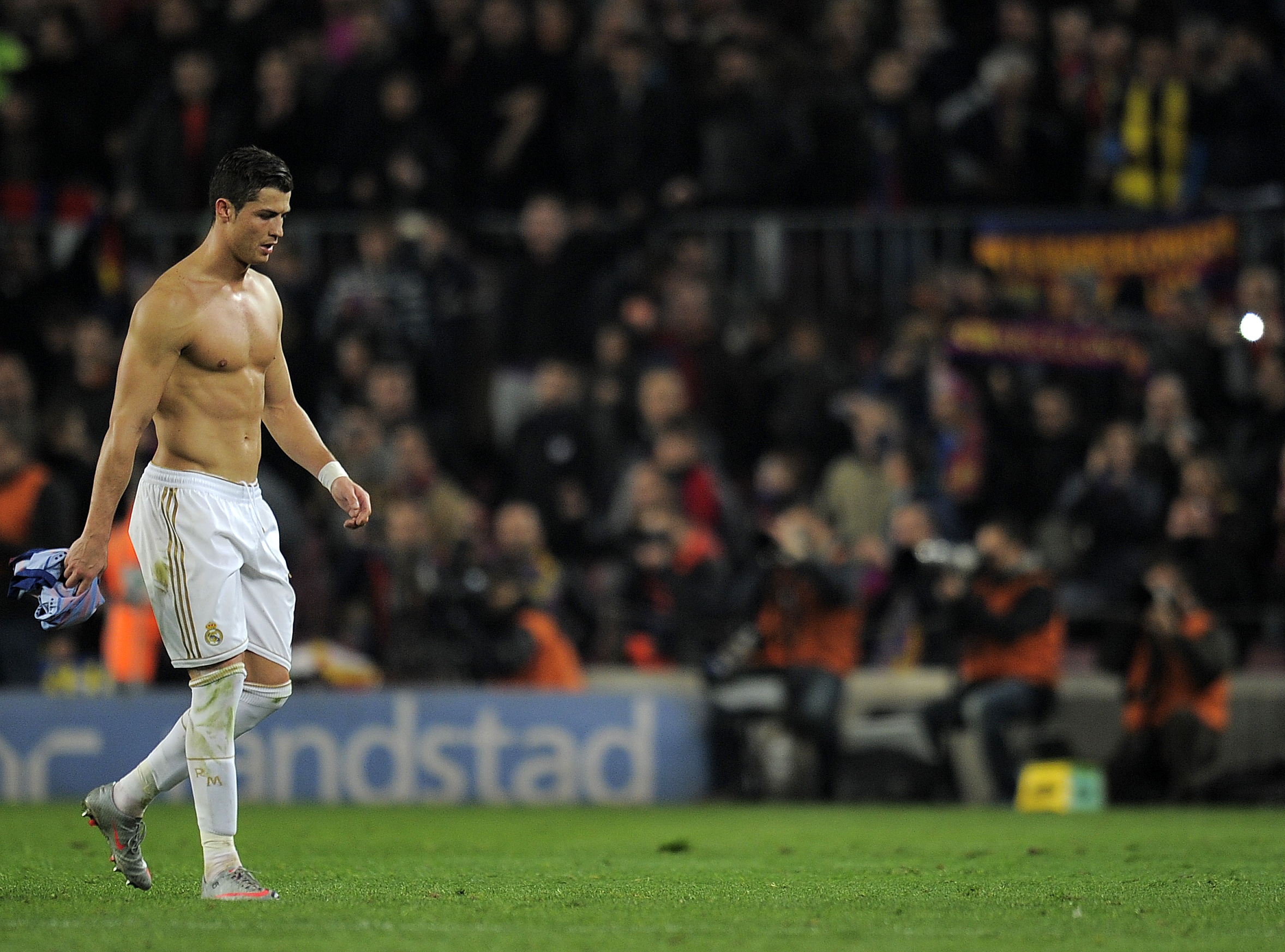 Real Madrid's Portuguese forward Cristiano Ronaldo leaves the field after the second leg of the Spanish Cup quarter-final "El clasico" football match Barcelona vs Real Madrid at the Camp Nou stadium in Barcelona on January 25, 2012. (Luis Gene—AFP/Getty Images)