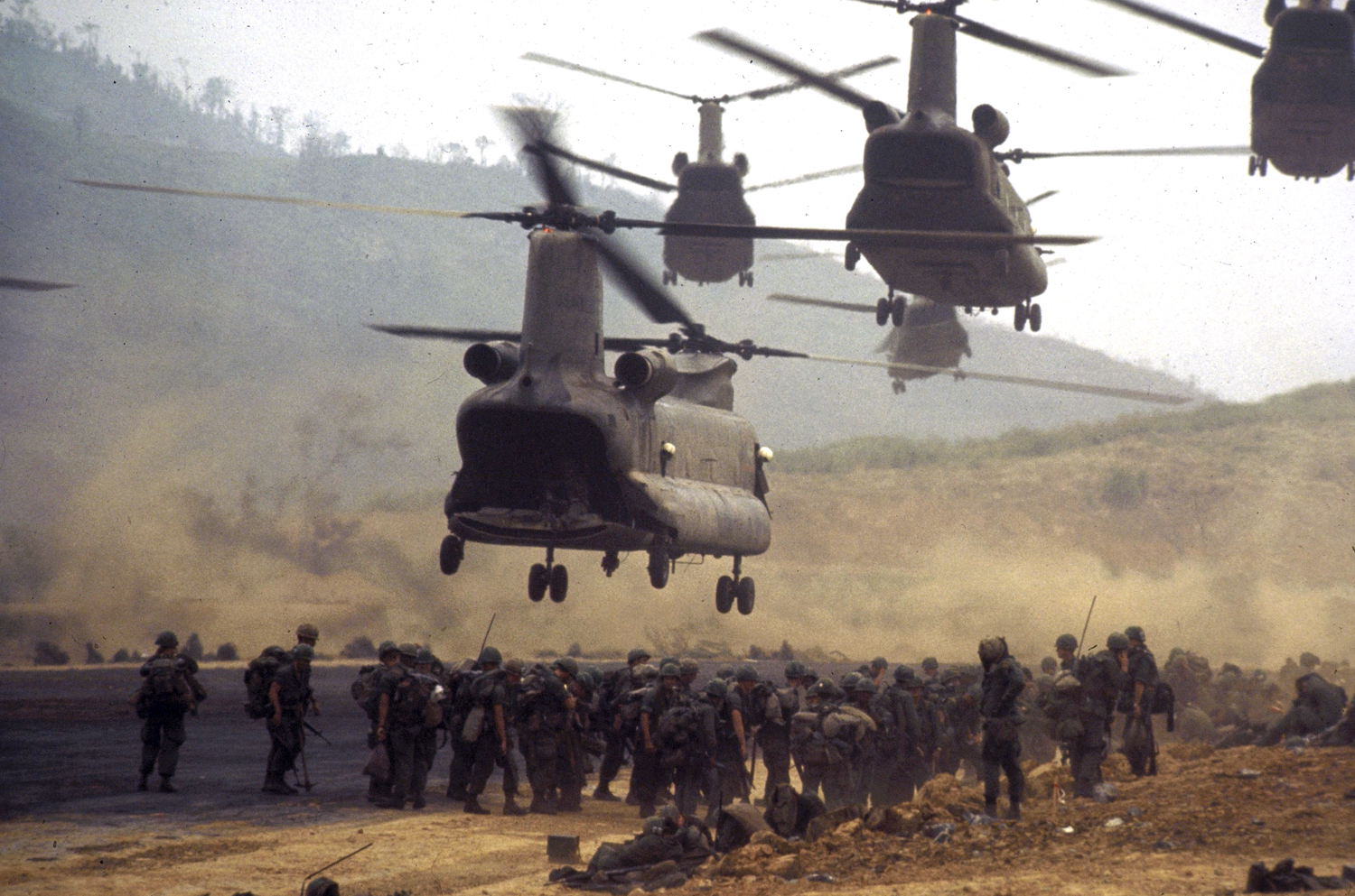 Chinook helicopters taking off after deploying ground troops along area known as "Route 9" for an offensive patrol, Operation Pegasus, Vietnam, 1968.
